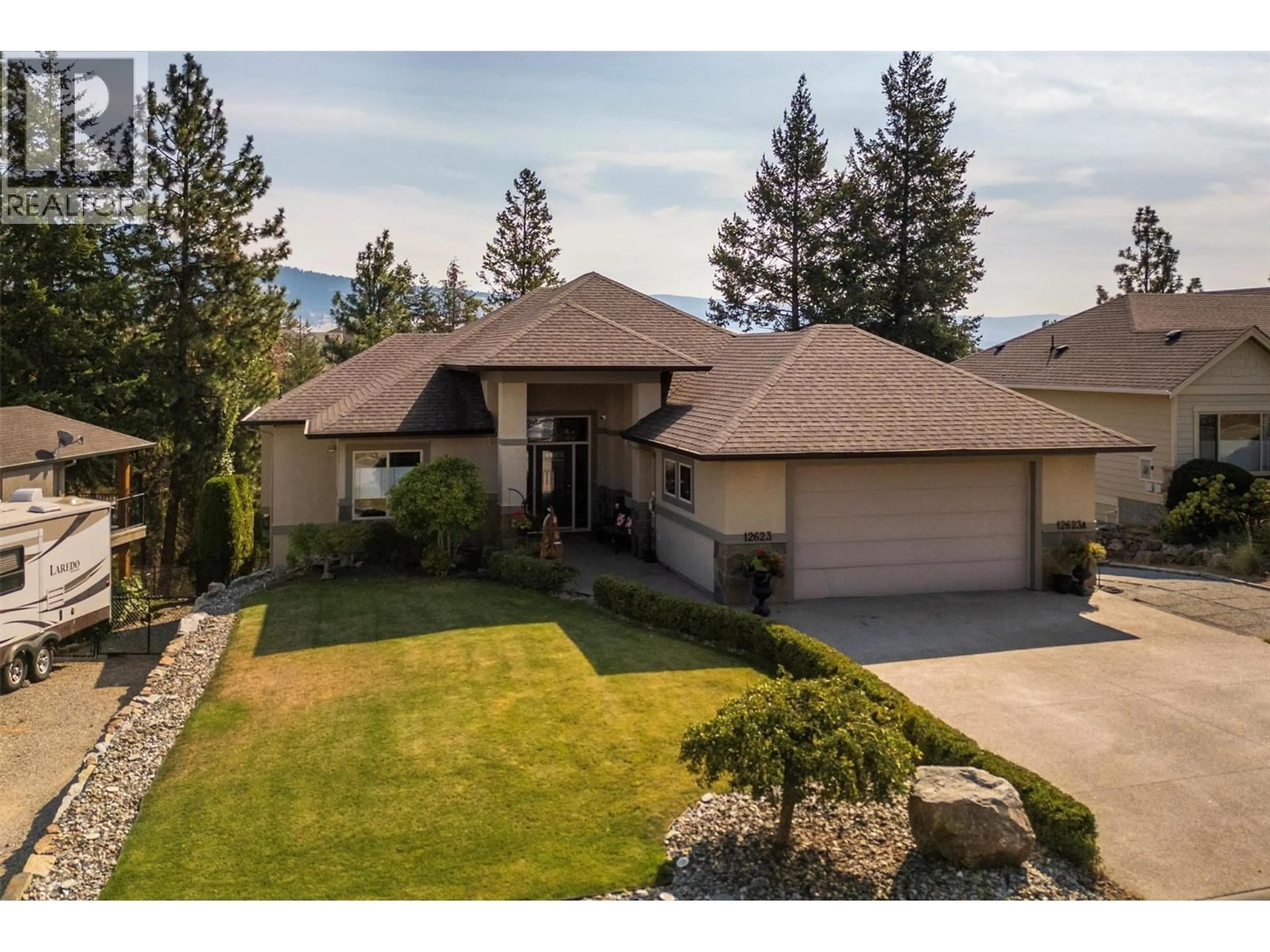 A pic from outside/outdoor area/front of a property/back of a property/a pic from drone, unknown for 12623 DRIFTWOOD COURT, Lake Country British Columbia V4V2M9