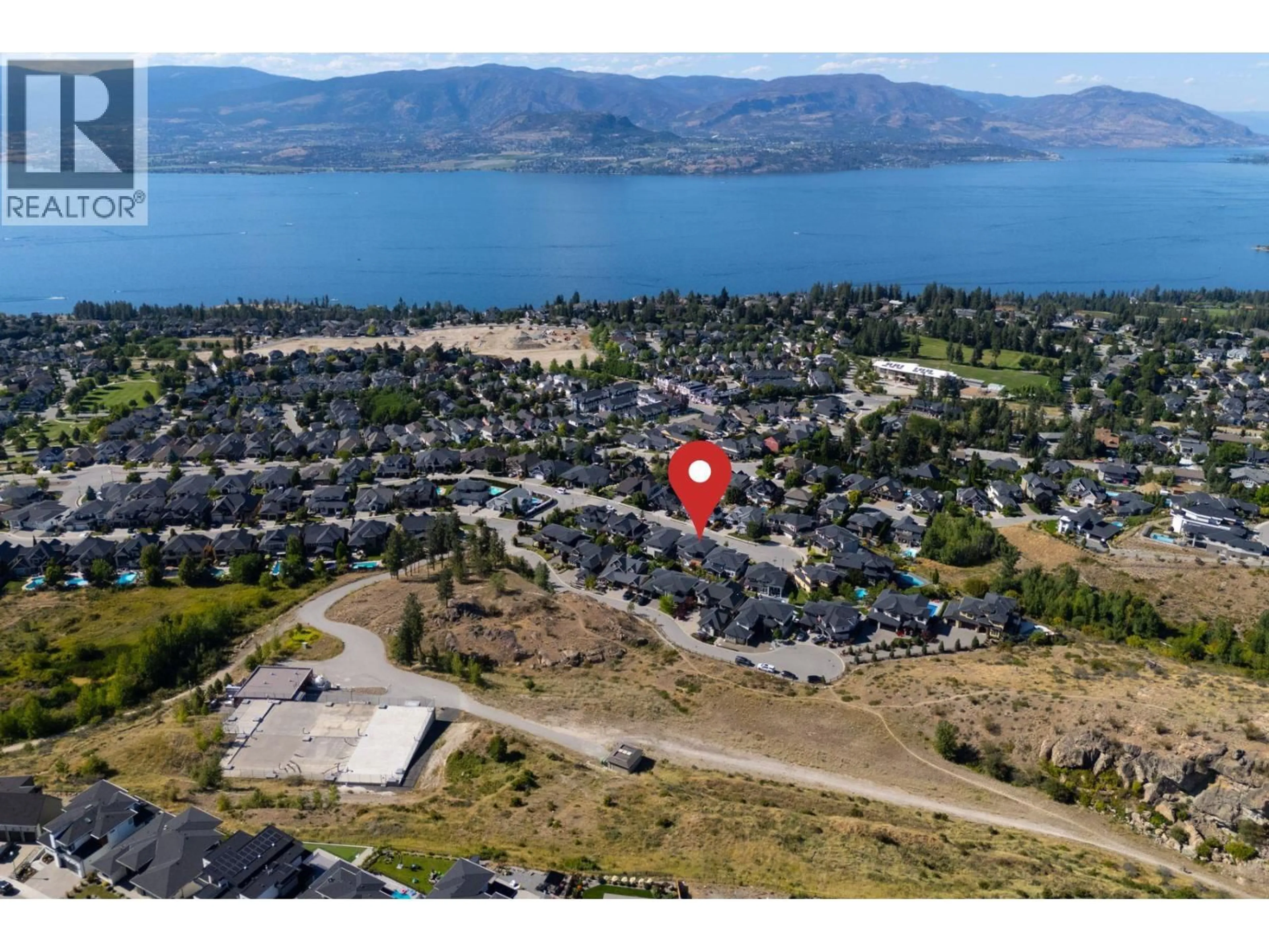 A pic from outside/outdoor area/front of a property/back of a property/a pic from drone, water/lake/river/ocean view for 453 LAKEPOINTE DRIVE, Kelowna British Columbia V1W5K2