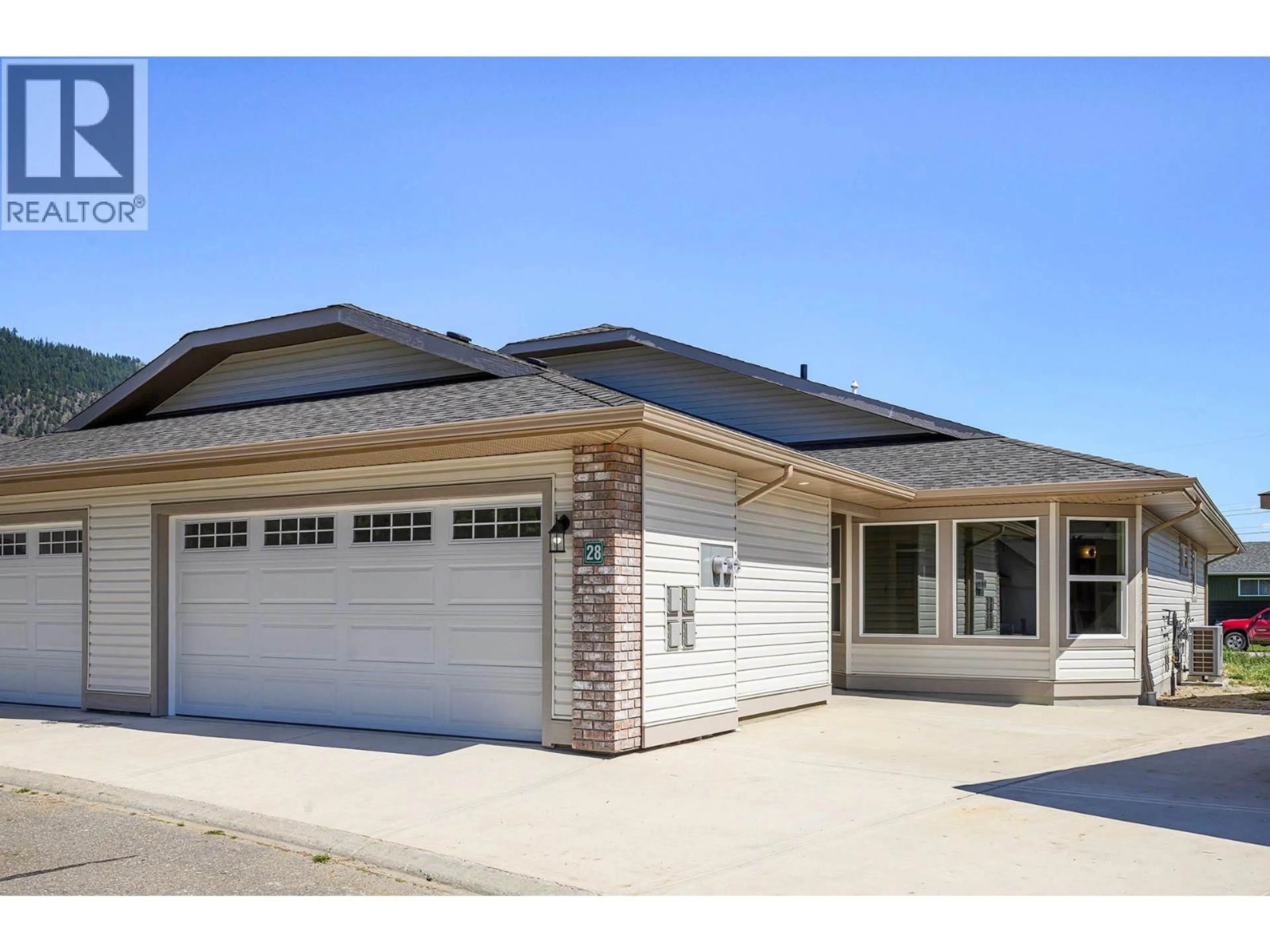 Home with vinyl exterior material, street for 28 - 312 ARBUTUS STREET, Chase British Columbia V0E1M0
