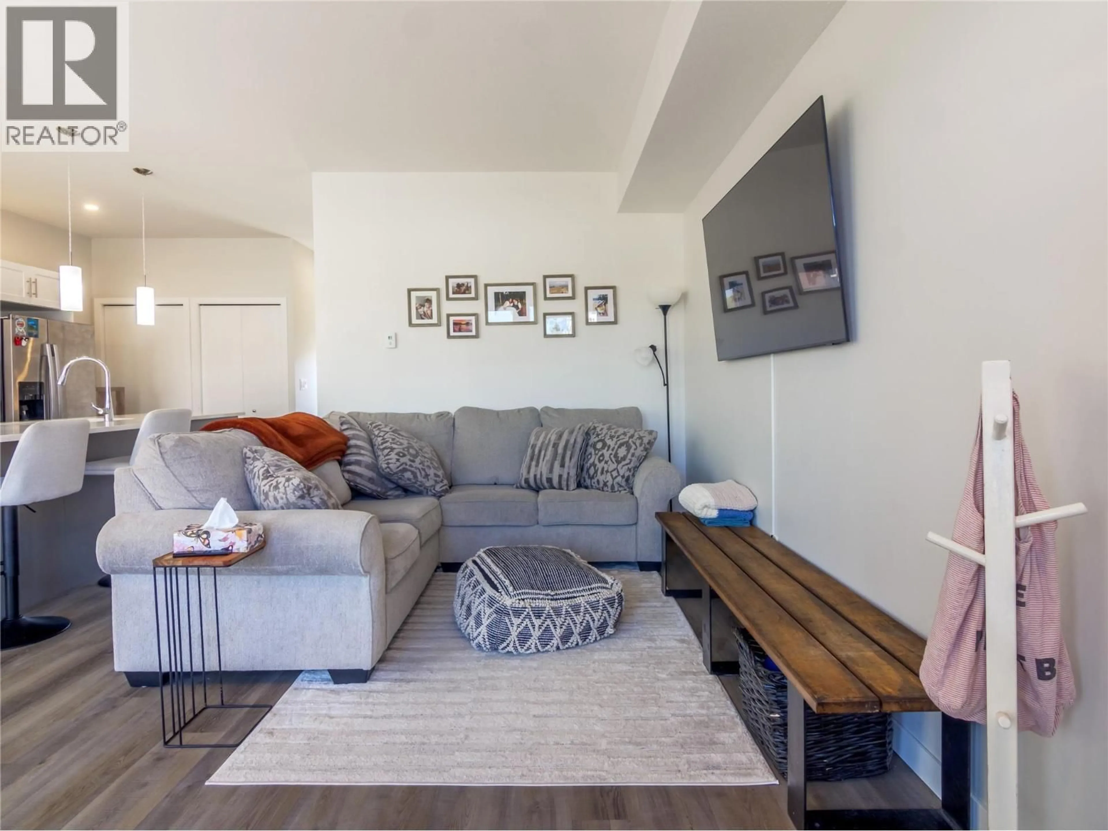 Living room with furniture, unknown for 101 - 128 COSSAR AVENUE, Penticton British Columbia V2A2V4