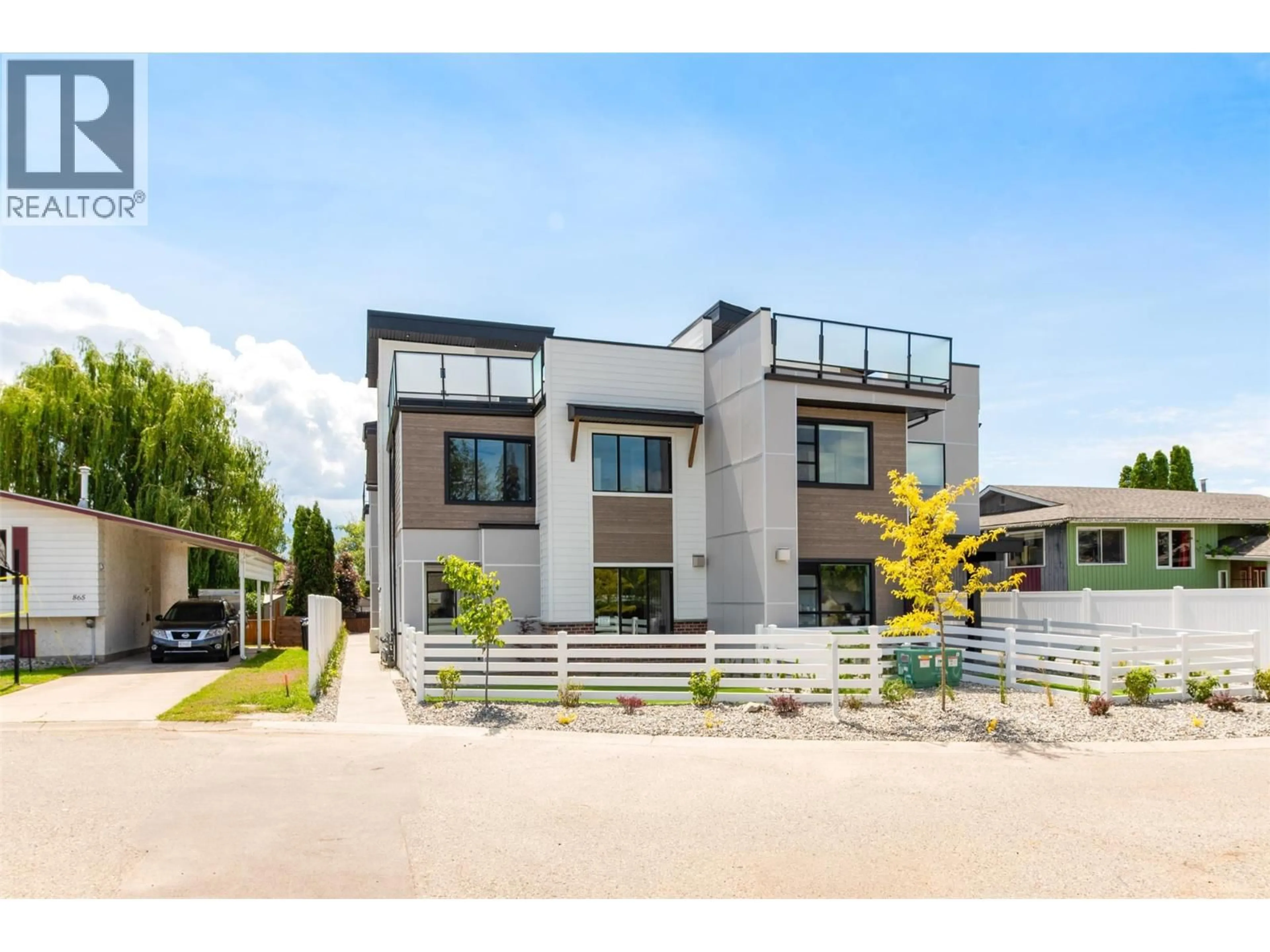Home with brick exterior material, street for 857 KINNEAR COURT, Kelowna British Columbia V1Y8A9