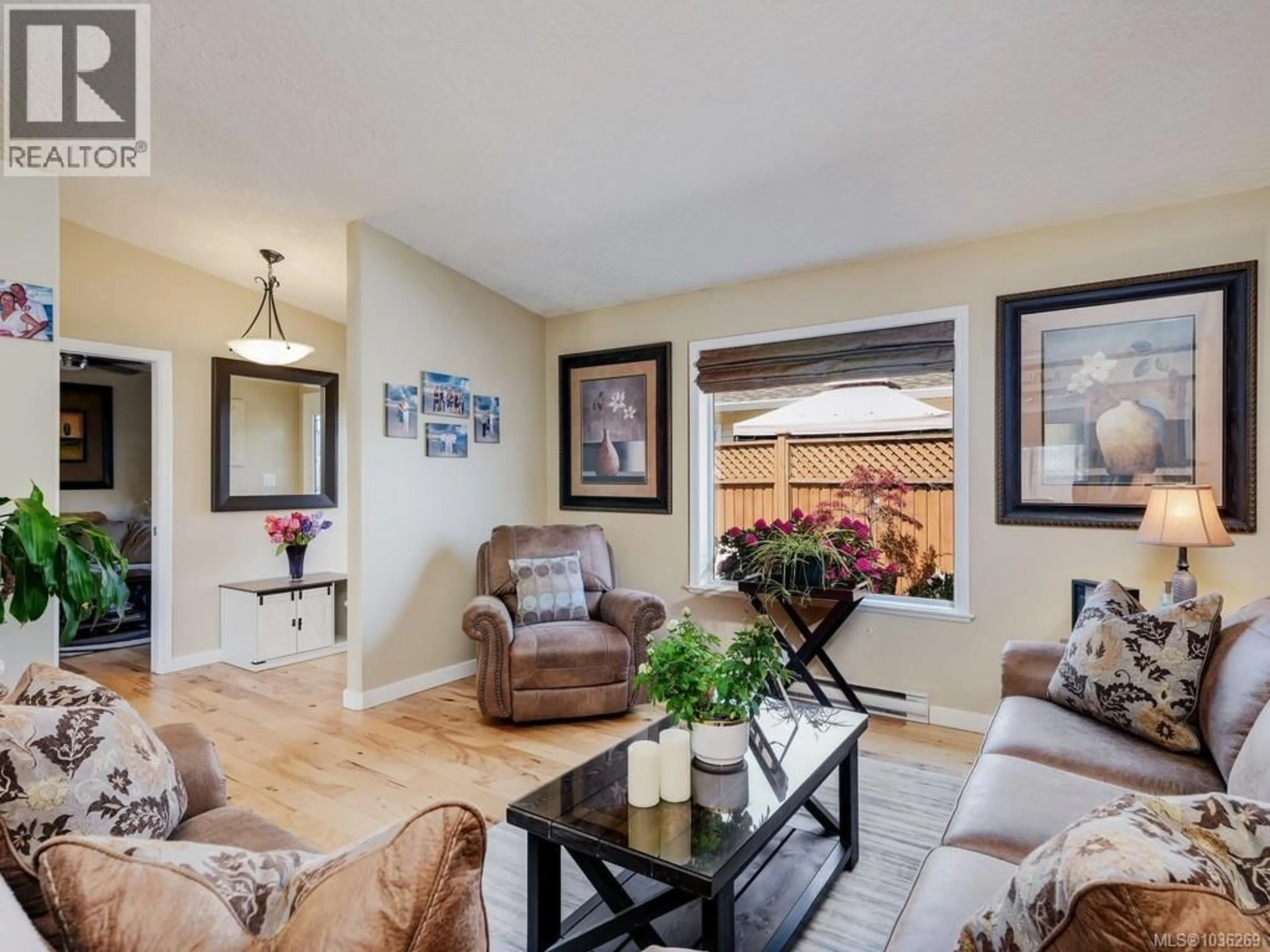 Living room with furniture, unknown for 104 - 7570 TETAYUT ROAD, Central Saanich British Columbia V8M2H4