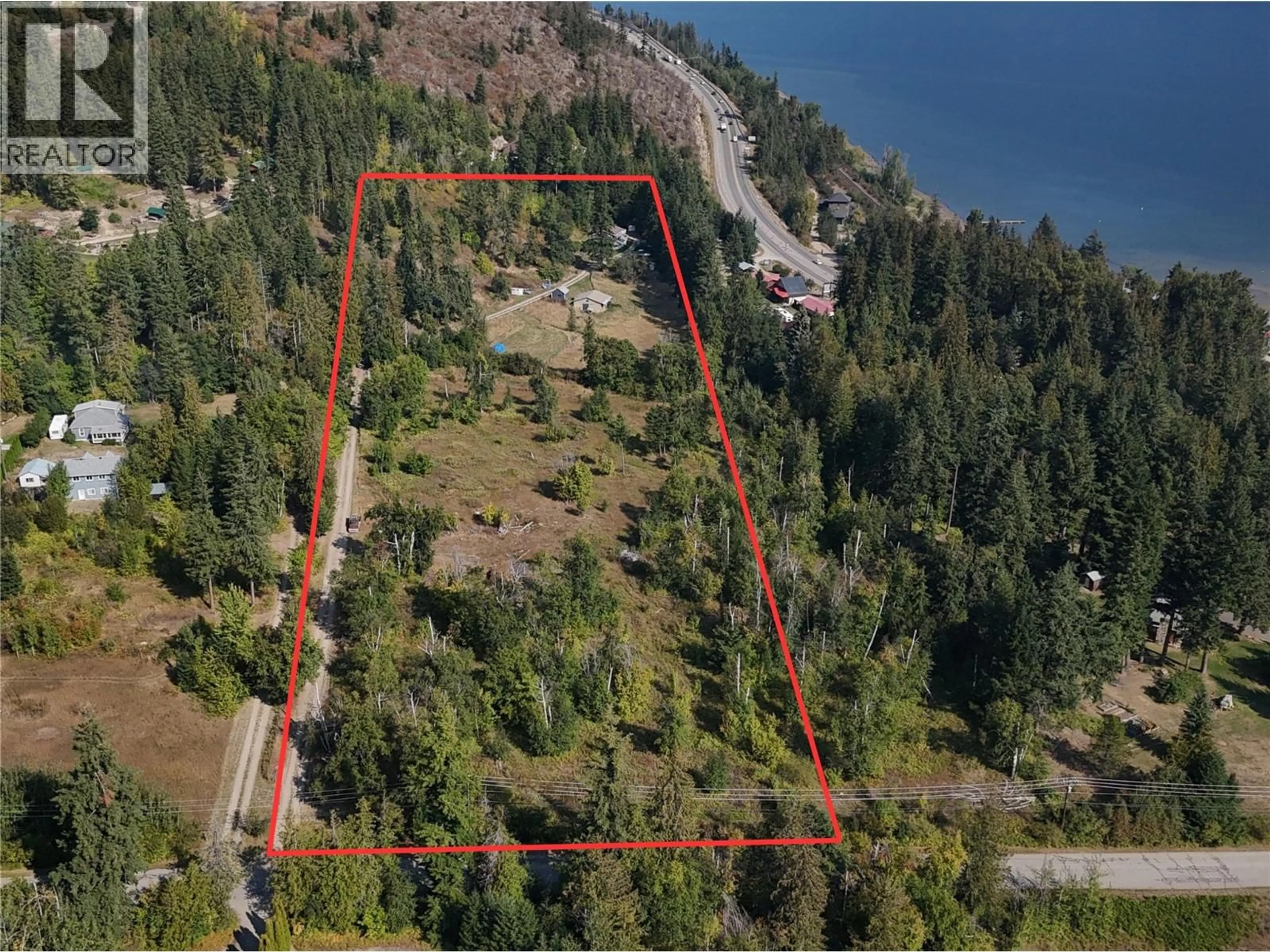 A pic from outside/outdoor area/front of a property/back of a property/a pic from drone, water/lake/river/ocean view for 3591 65 AVENUE NORTHWEST, Salmon Arm British Columbia V1E3A2