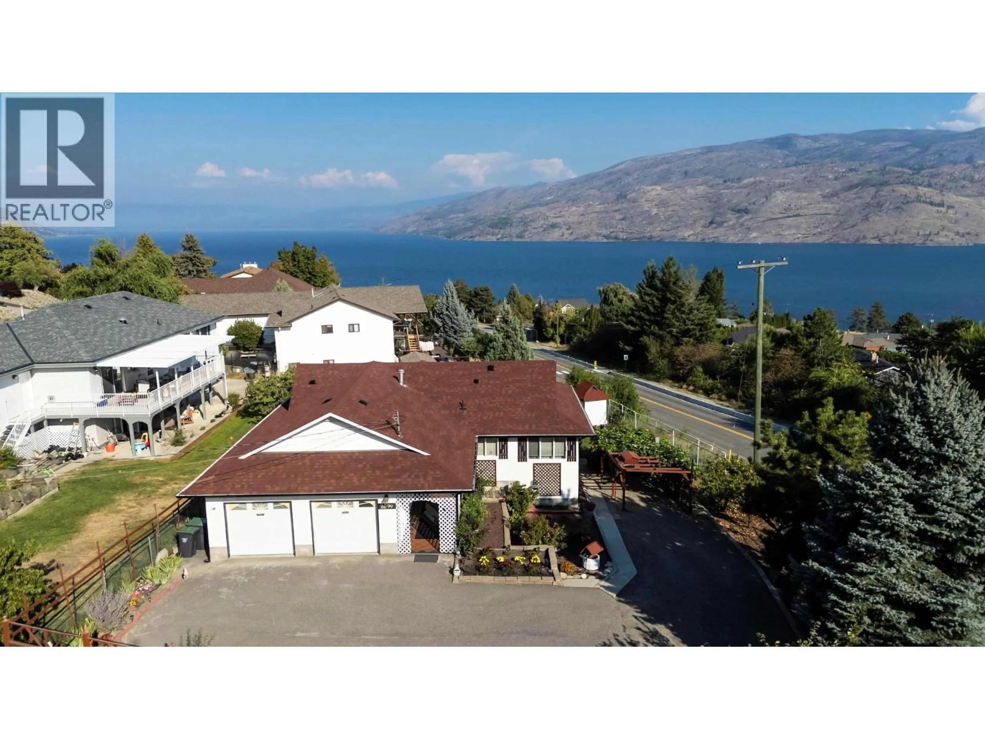 A pic from outside/outdoor area/front of a property/back of a property/a pic from drone, water/lake/river/ocean view for 6099 ELLISON AVENUE, Peachland British Columbia V0H1X4