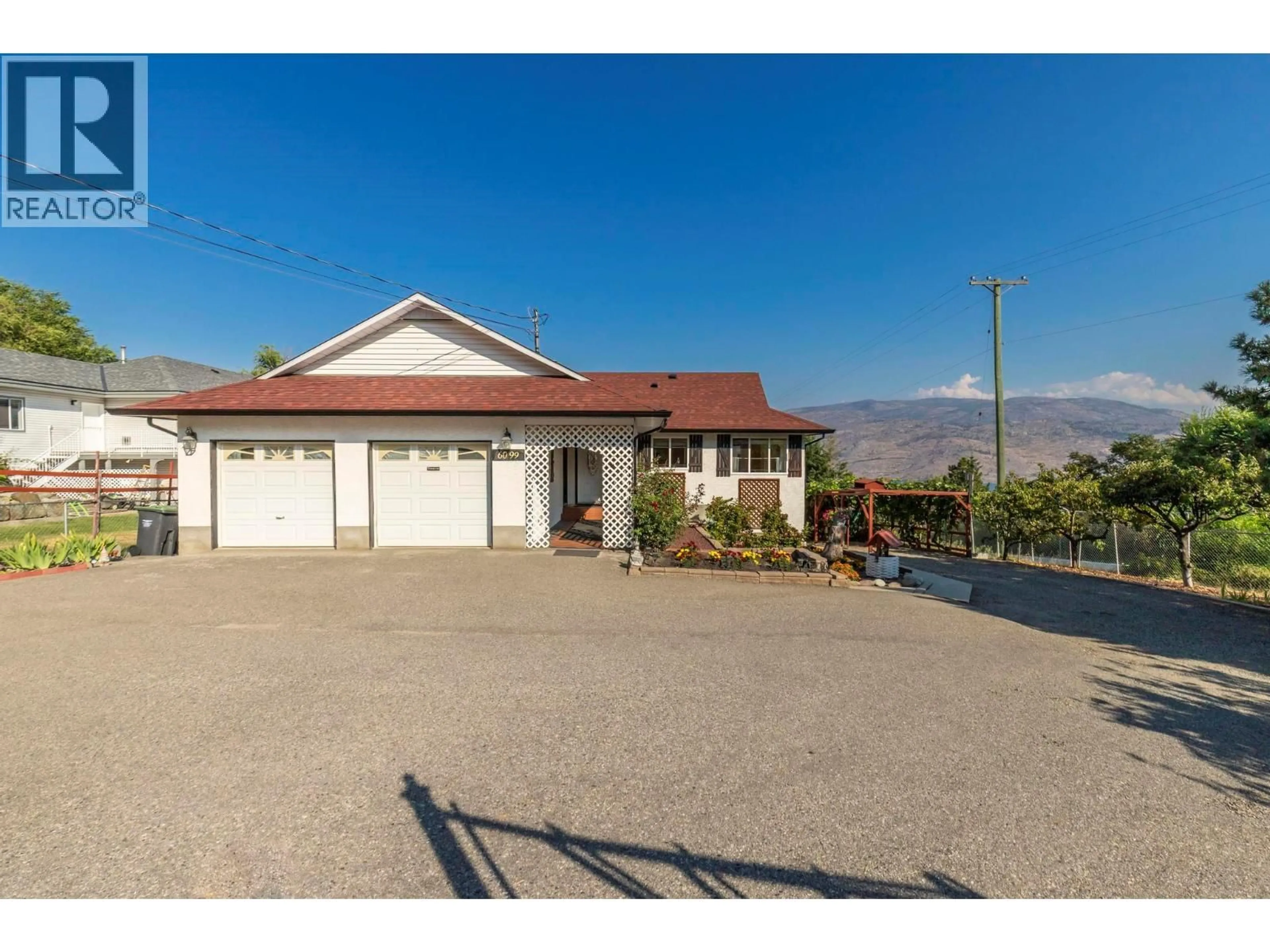 A pic from outside/outdoor area/front of a property/back of a property/a pic from drone, mountain view for 6099 ELLISON AVENUE, Peachland British Columbia V0H1X4