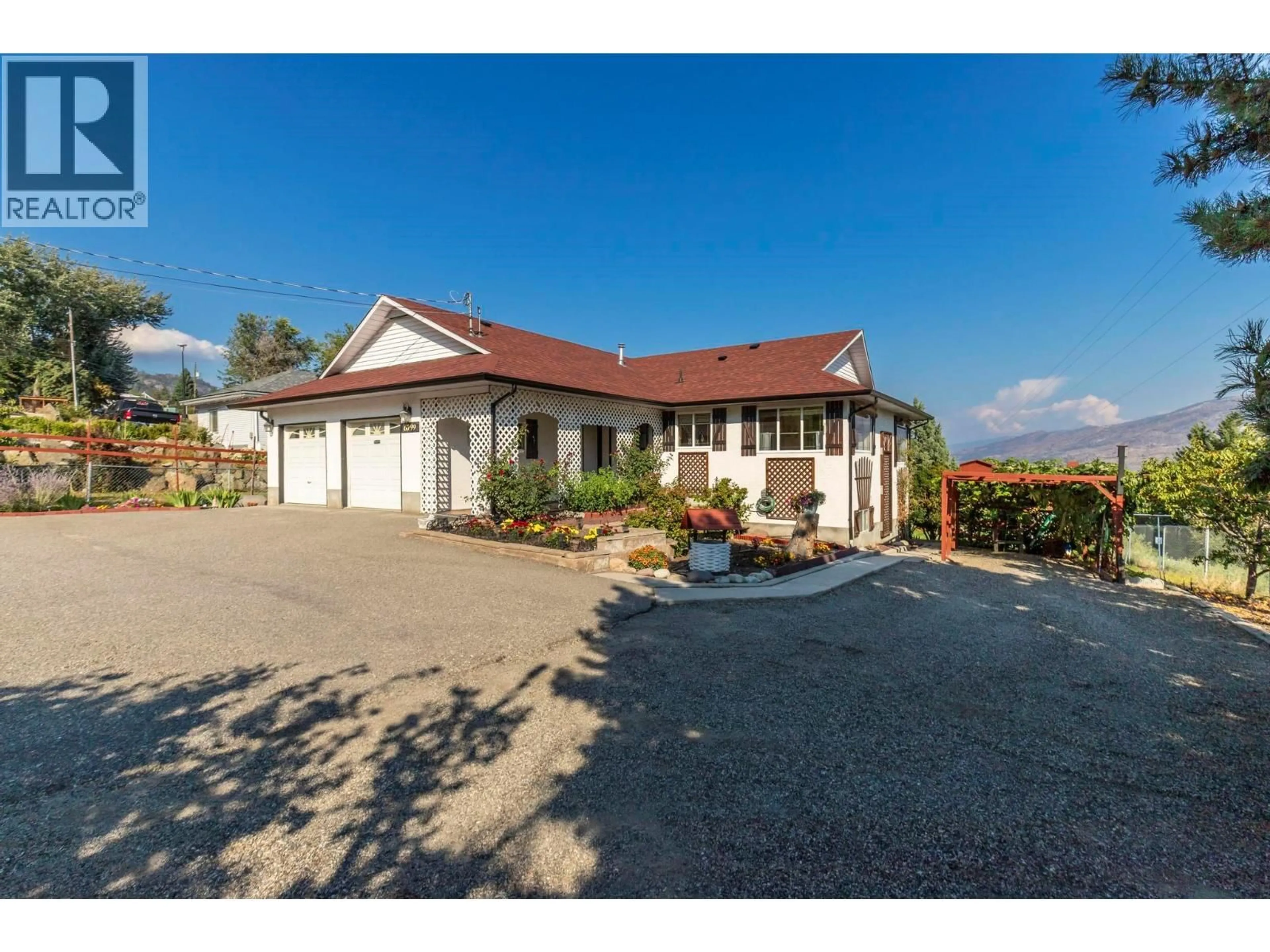 A pic from outside/outdoor area/front of a property/back of a property/a pic from drone, street for 6099 ELLISON AVENUE, Peachland British Columbia V0H1X4