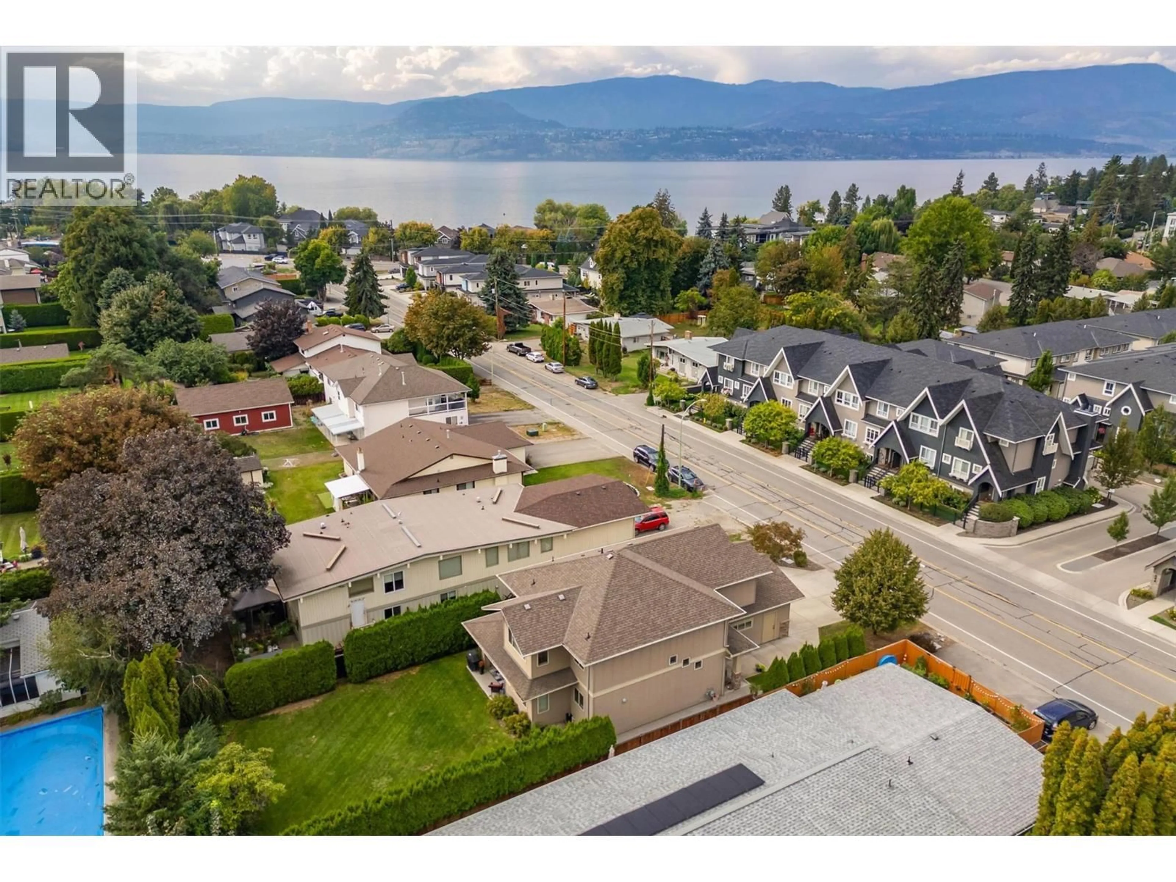 A pic from outside/outdoor area/front of a property/back of a property/a pic from drone, water/lake/river/ocean view for 679 OLD MEADOWS ROAD, Kelowna British Columbia V1W1S3