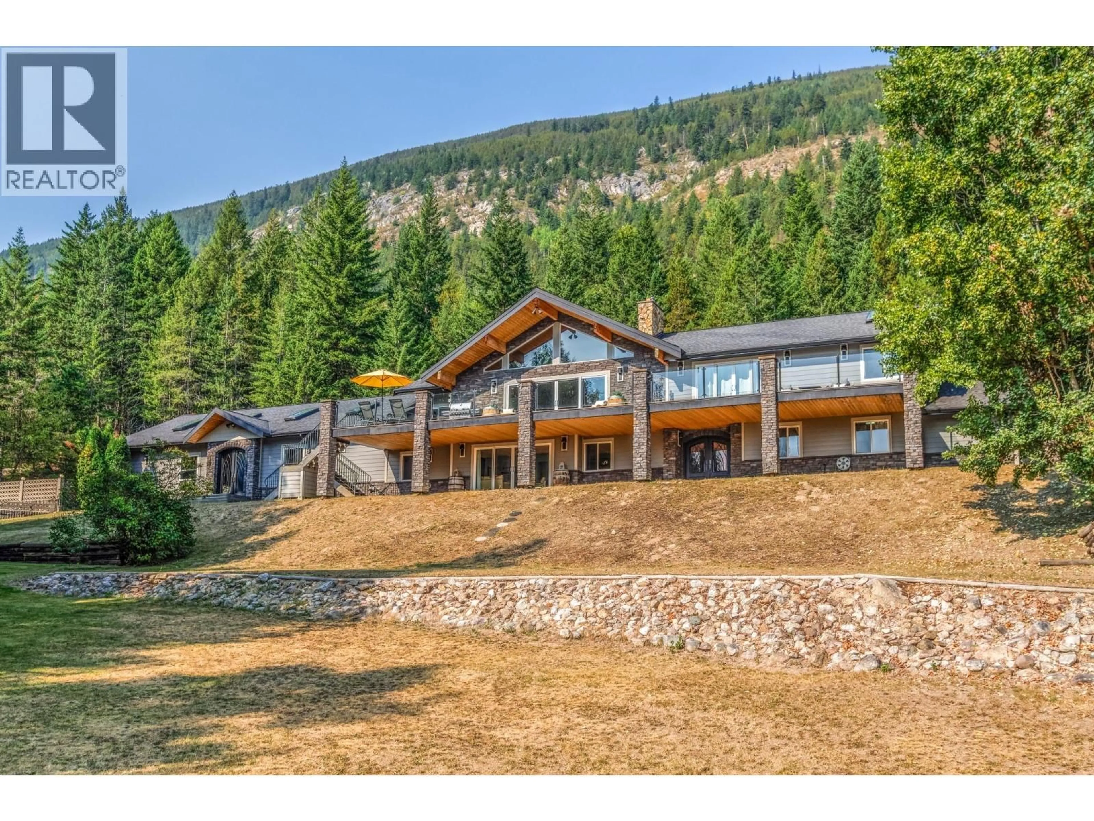 A pic from outside/outdoor area/front of a property/back of a property/a pic from drone, mountain view for 6171 50 STREET NORTHWEST, Salmon Arm British Columbia V1E3A6