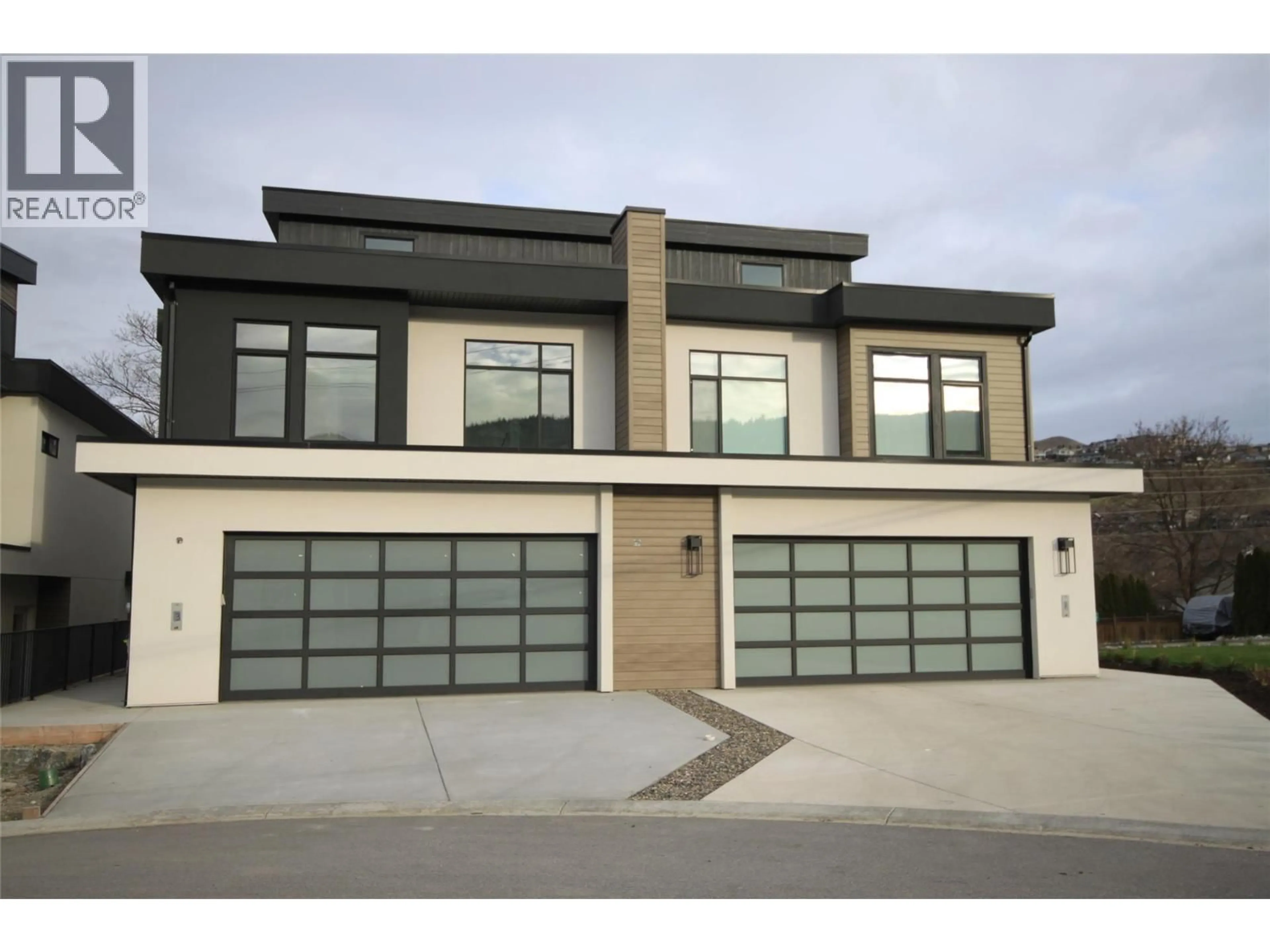Home with brick exterior material, street for 5 - 7920 KIDSTON ROAD, Coldstream British Columbia V1B0B4
