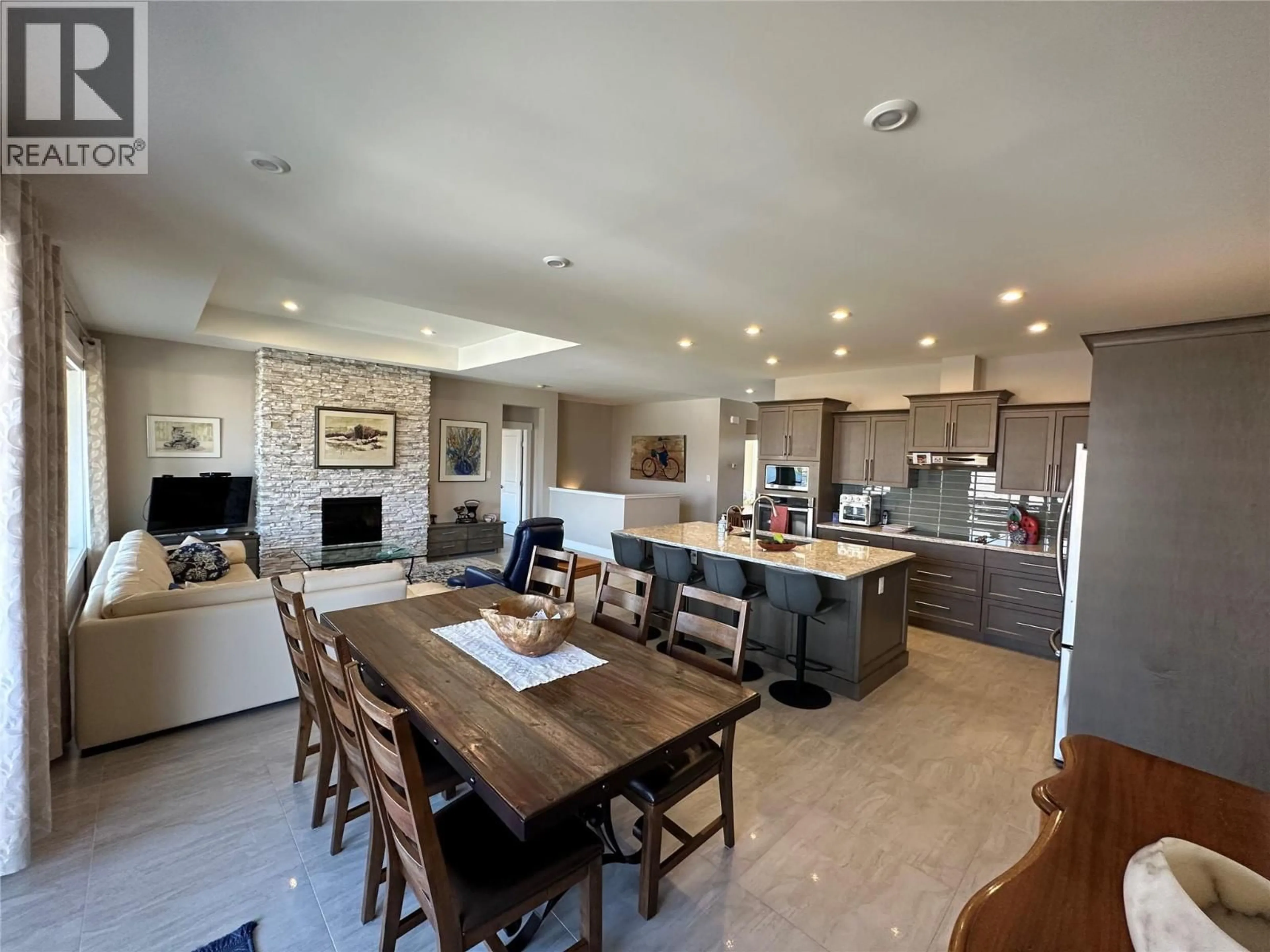 Open concept kitchen, ceramic/tile floor for 440 MERLOT AVENUE, Oliver British Columbia V0H1T4