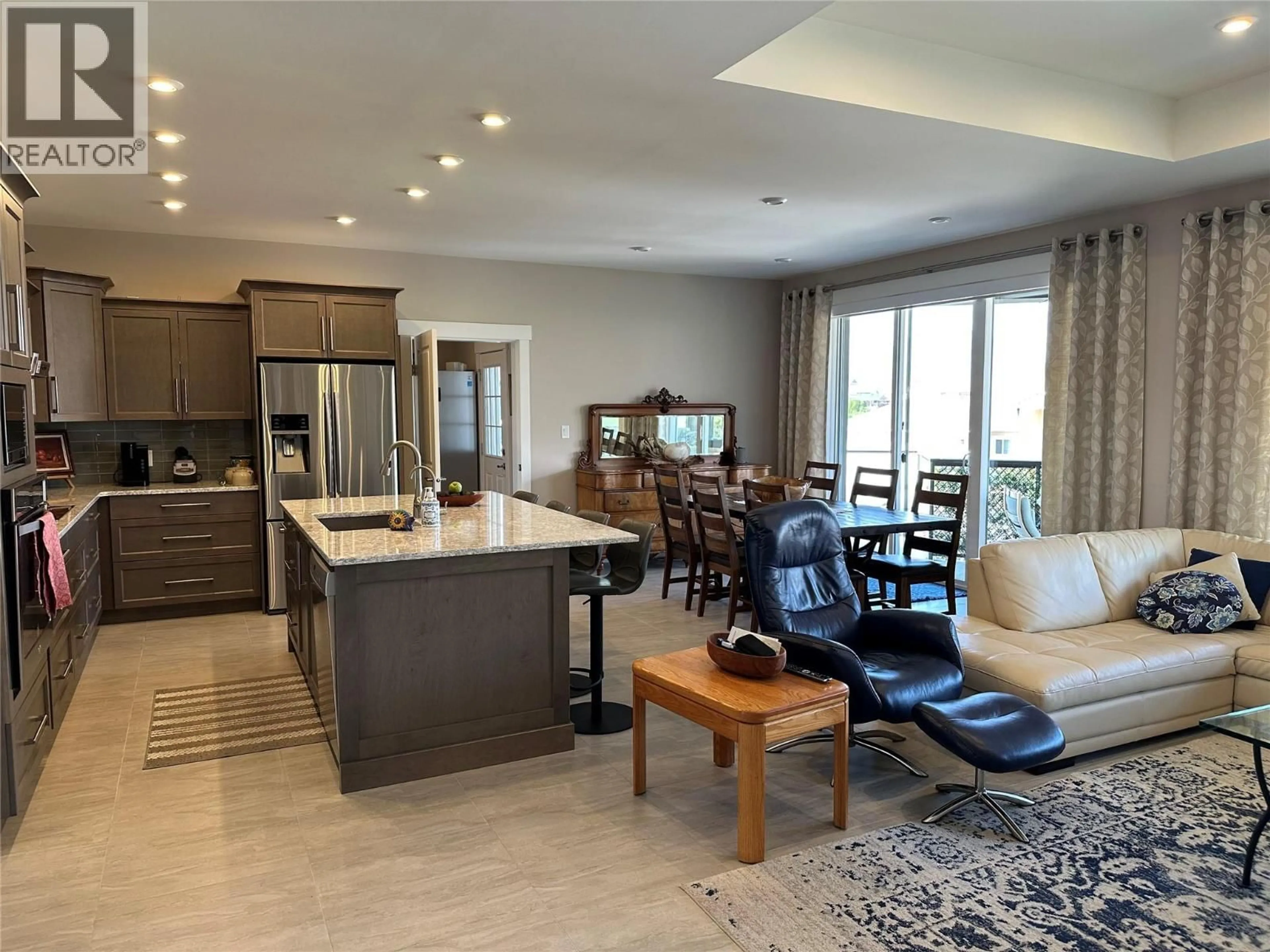 Open concept kitchen, ceramic/tile floor for 440 MERLOT AVENUE, Oliver British Columbia V0H1T4