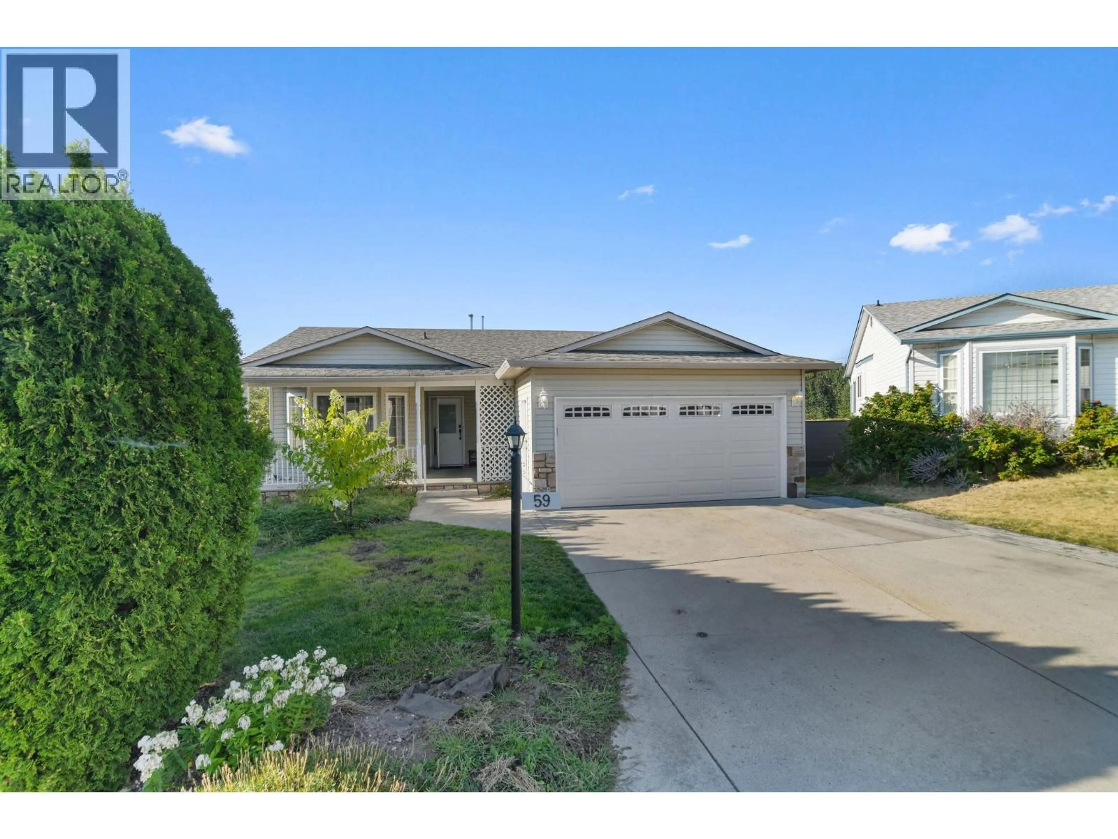Home with vinyl exterior material, street for 59 - 6100 OLD VERNON ROAD, Kelowna British Columbia V1X7T8