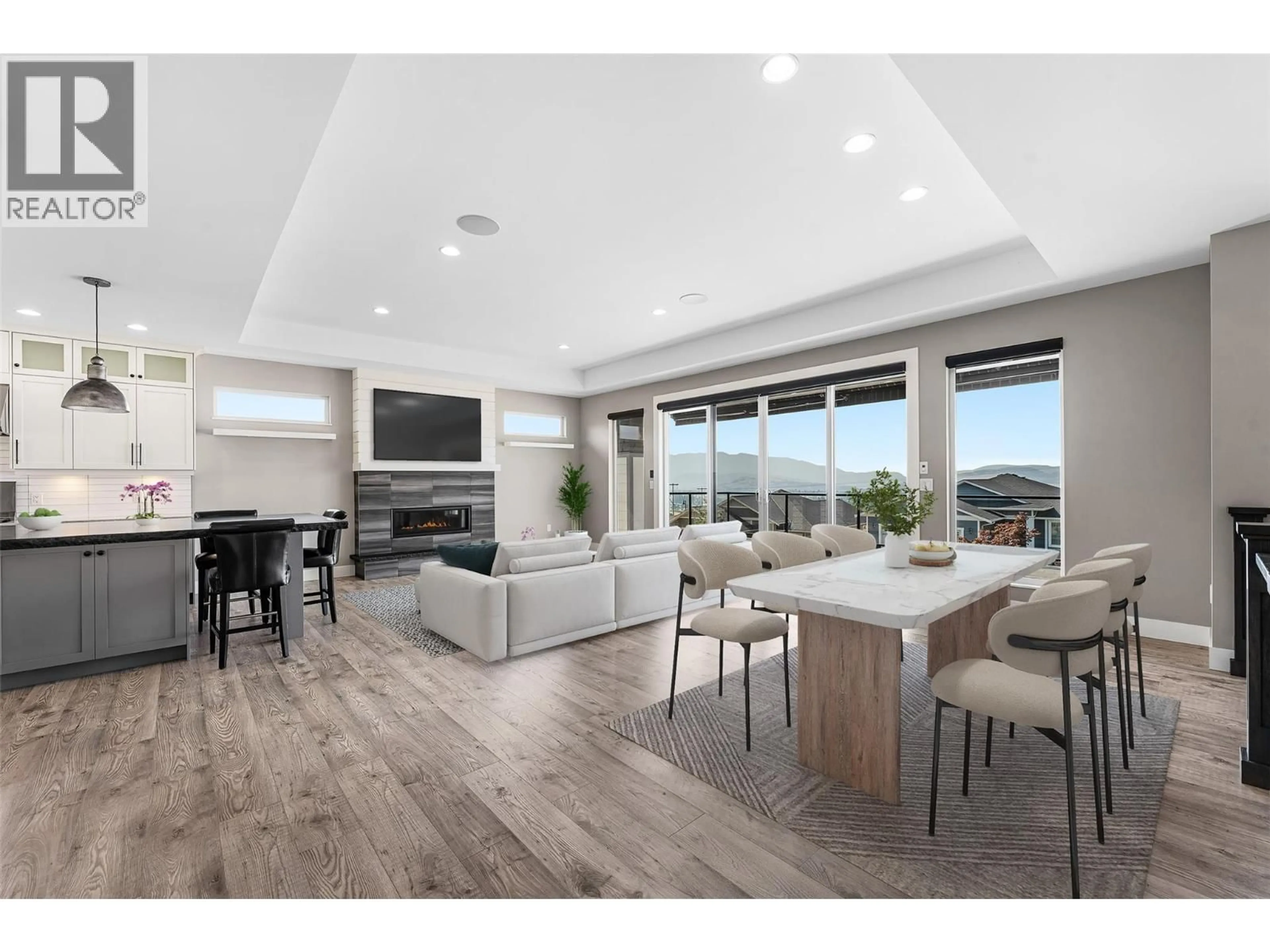 Open concept kitchen, wood/laminate floor for 6539 BLACKCOMB PLACE, Vernon British Columbia V1B4E1