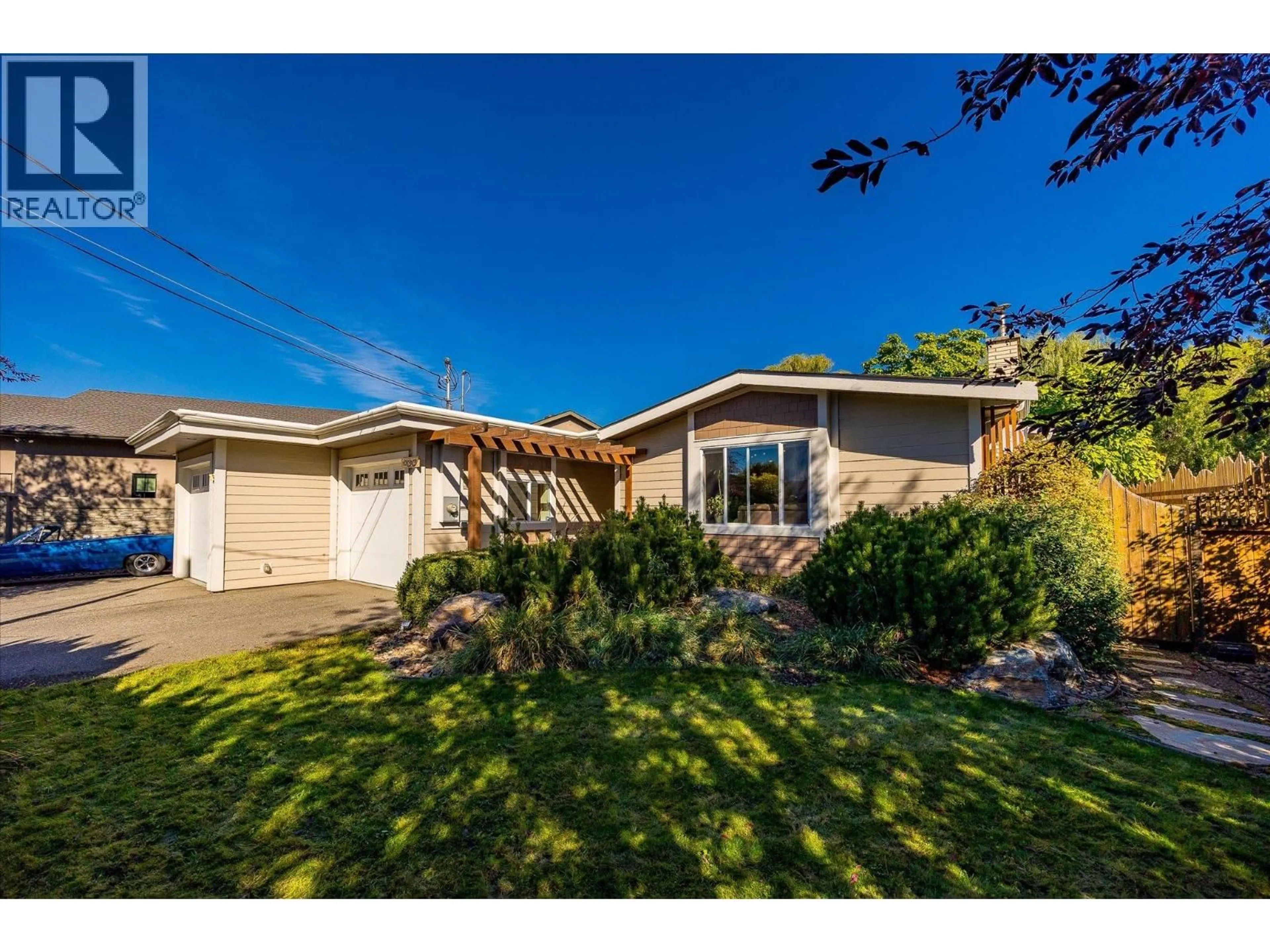 Home with vinyl exterior material, street for 12313 KALAVISTA DRIVE, Coldstream British Columbia V1B1K7