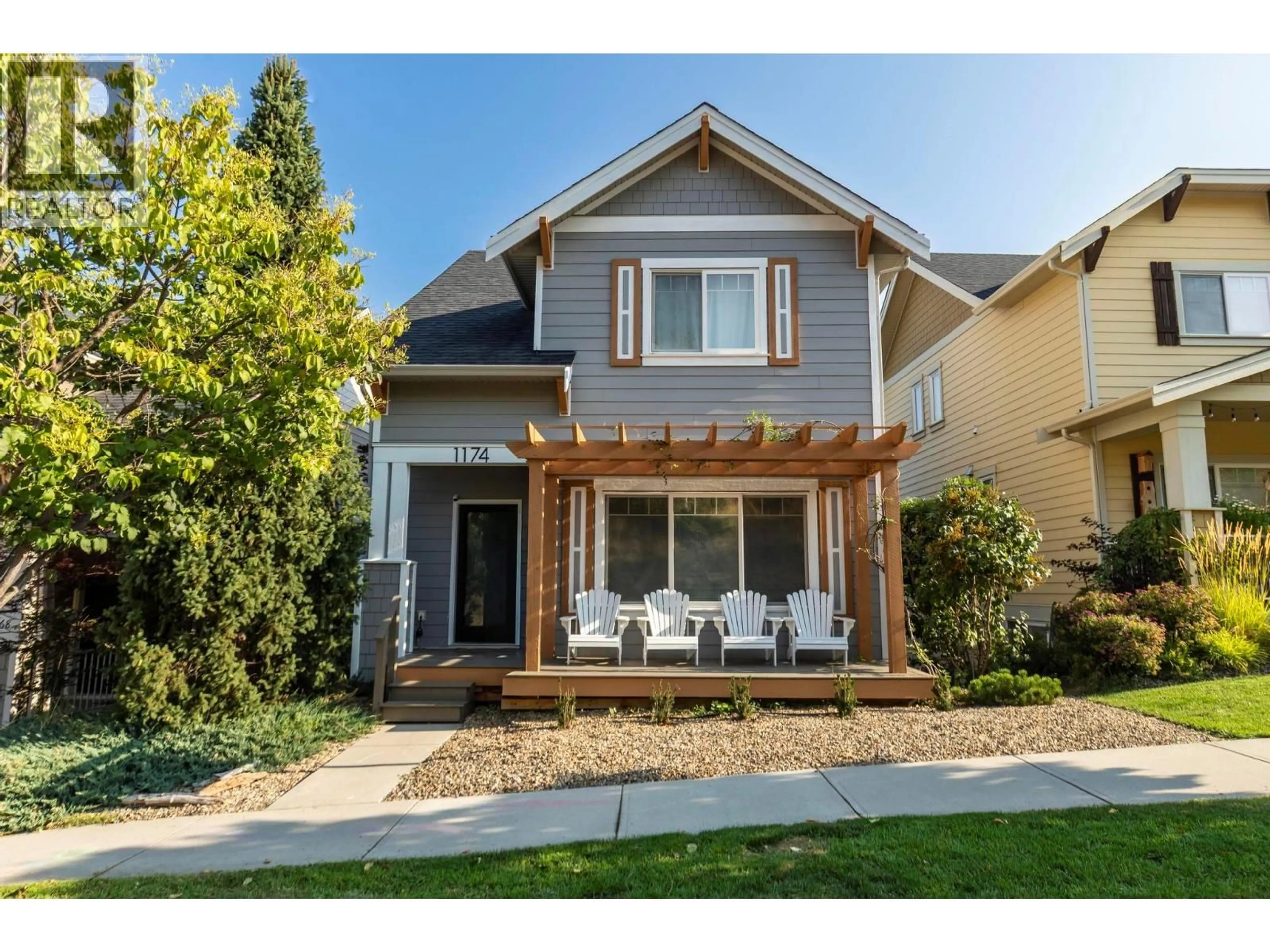 Home with vinyl exterior material, street for 1174 BERGAMOT AVENUE, Kelowna British Columbia V1W5K5