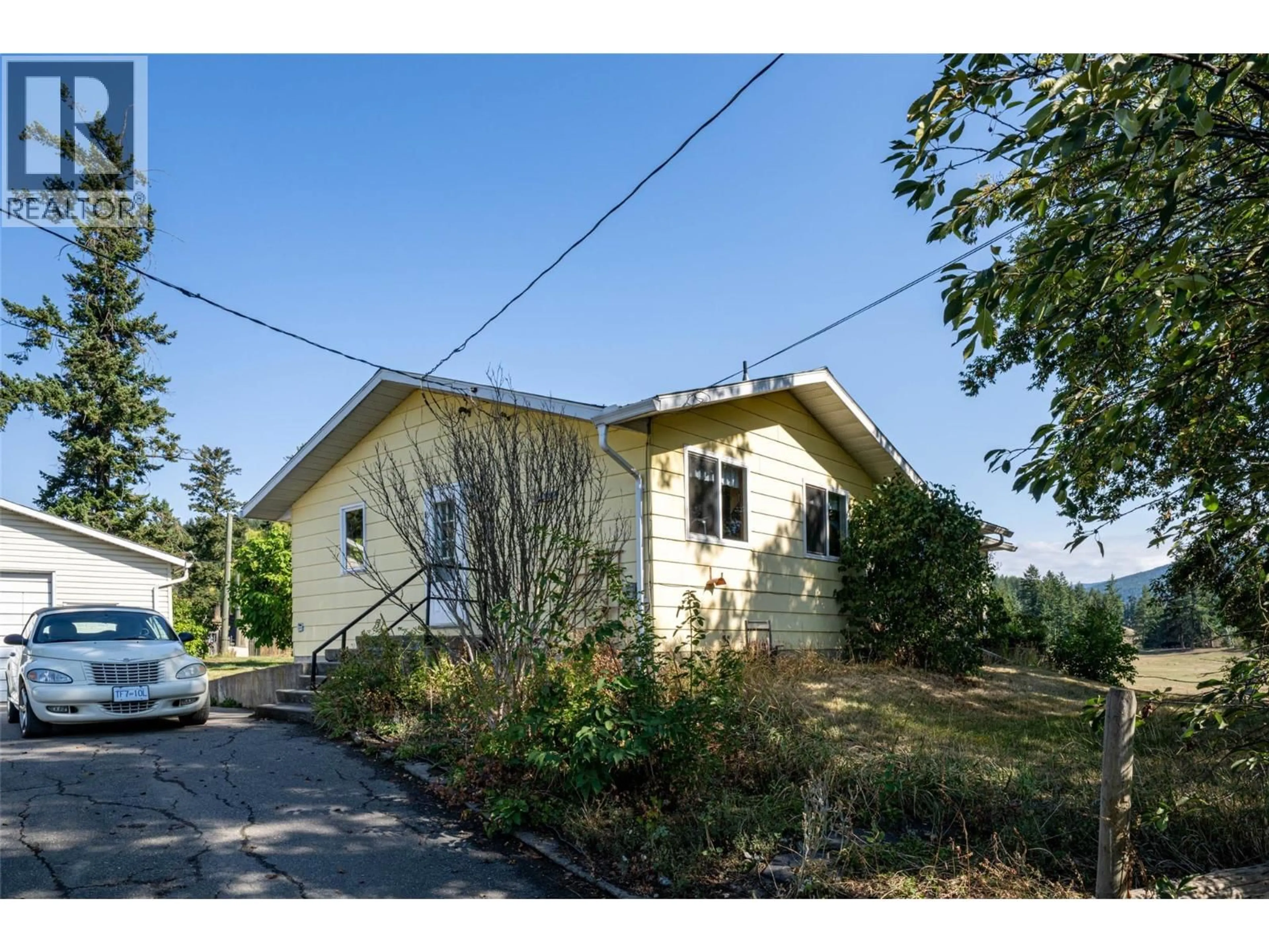 A pic from outside/outdoor area/front of a property/back of a property/a pic from drone, street for 4210 WHITE LAKE ROAD, Tappen British Columbia V0E2W1