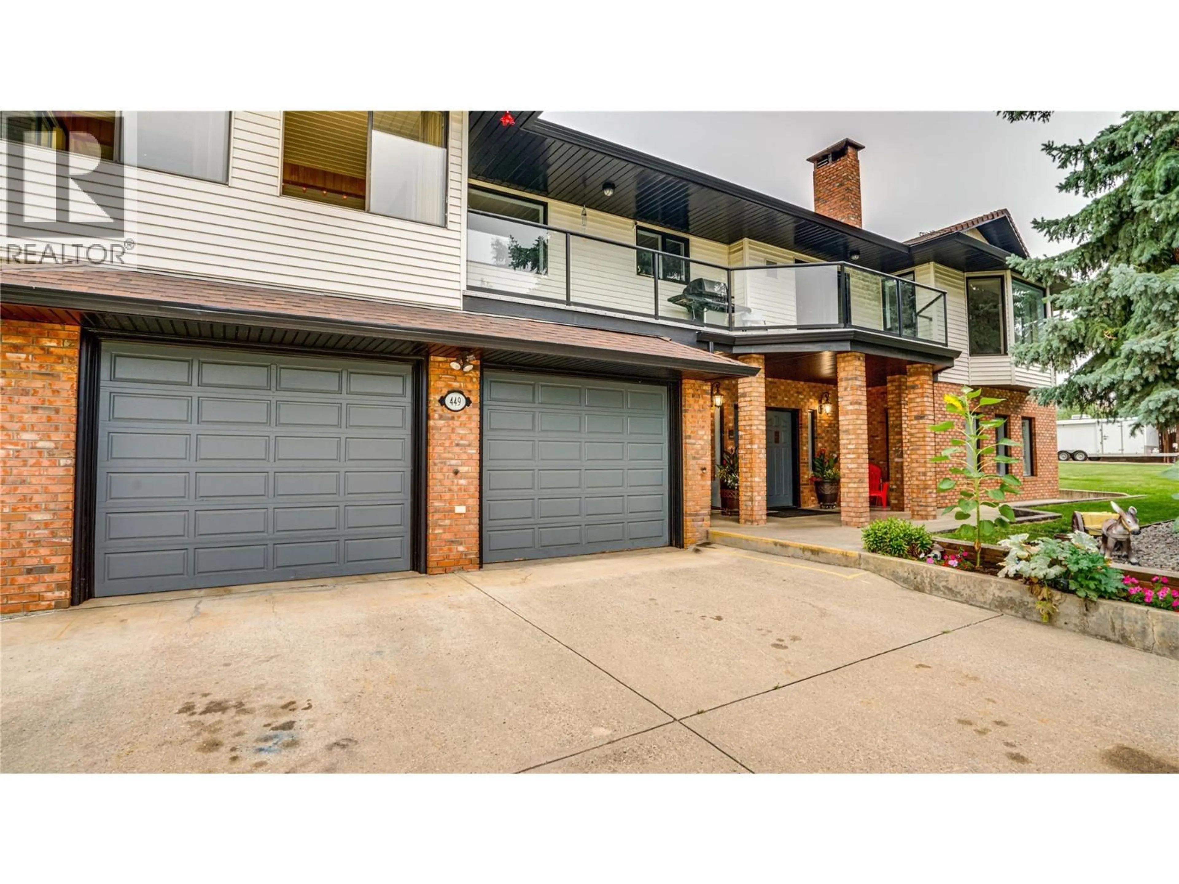 Home with brick exterior material, street for 449 CRESTVIEW DRIVE, Coldstream British Columbia V1B2X6