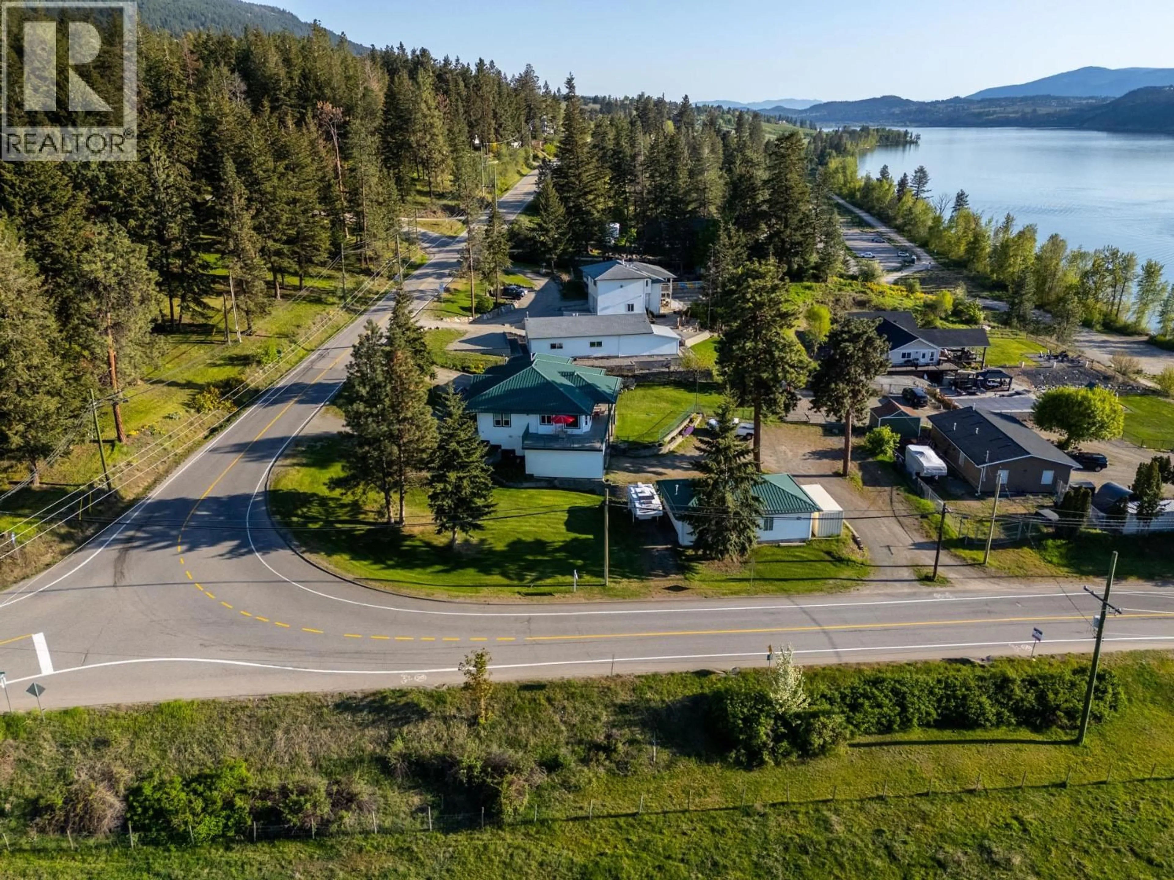 A pic from outside/outdoor area/front of a property/back of a property/a pic from drone, water/lake/river/ocean view for 15326 OYAMA ROAD, Lake Country British Columbia V4V2C5