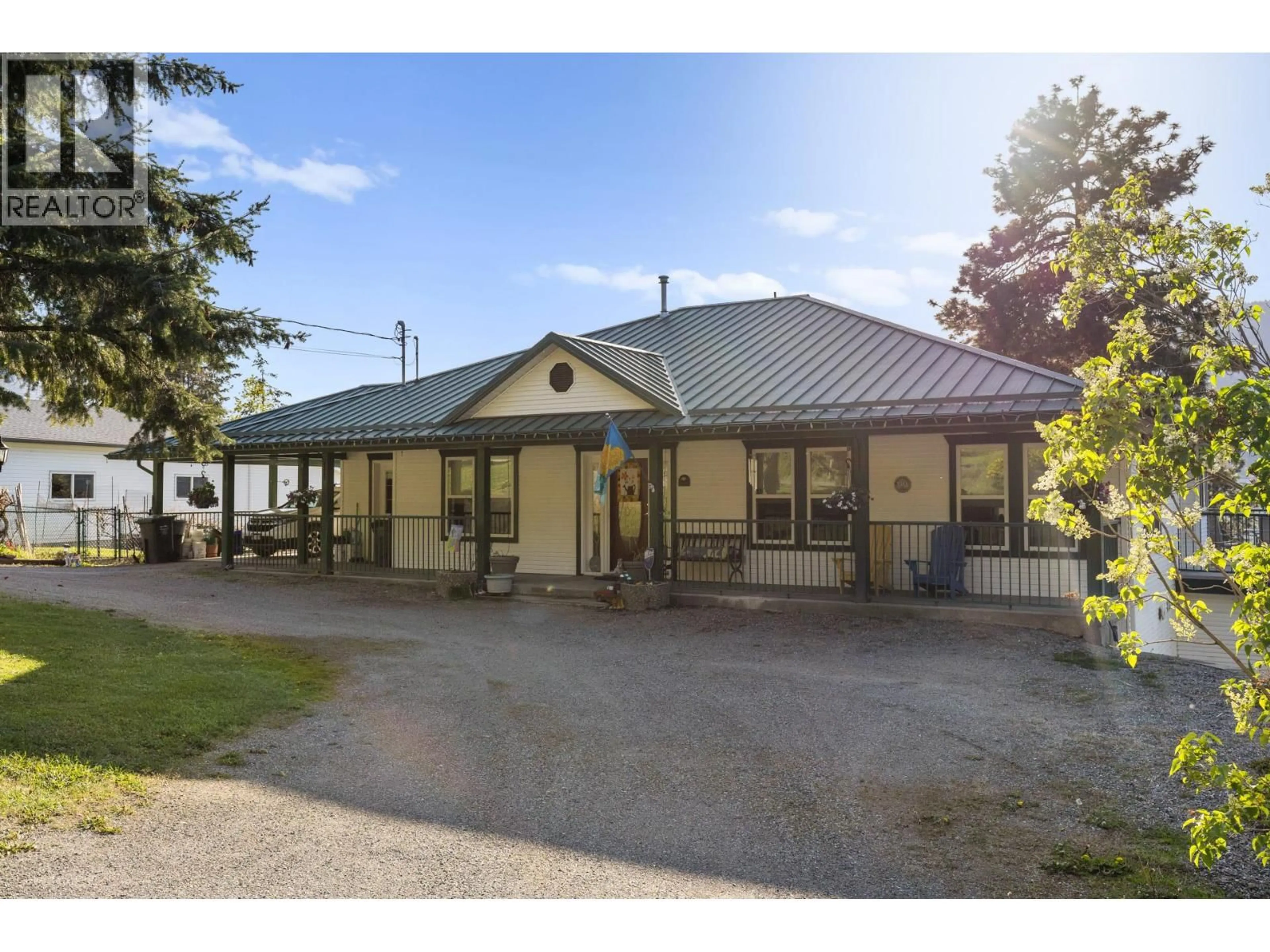 A pic from outside/outdoor area/front of a property/back of a property/a pic from drone, building for 15326 OYAMA ROAD, Lake Country British Columbia V4V2C5