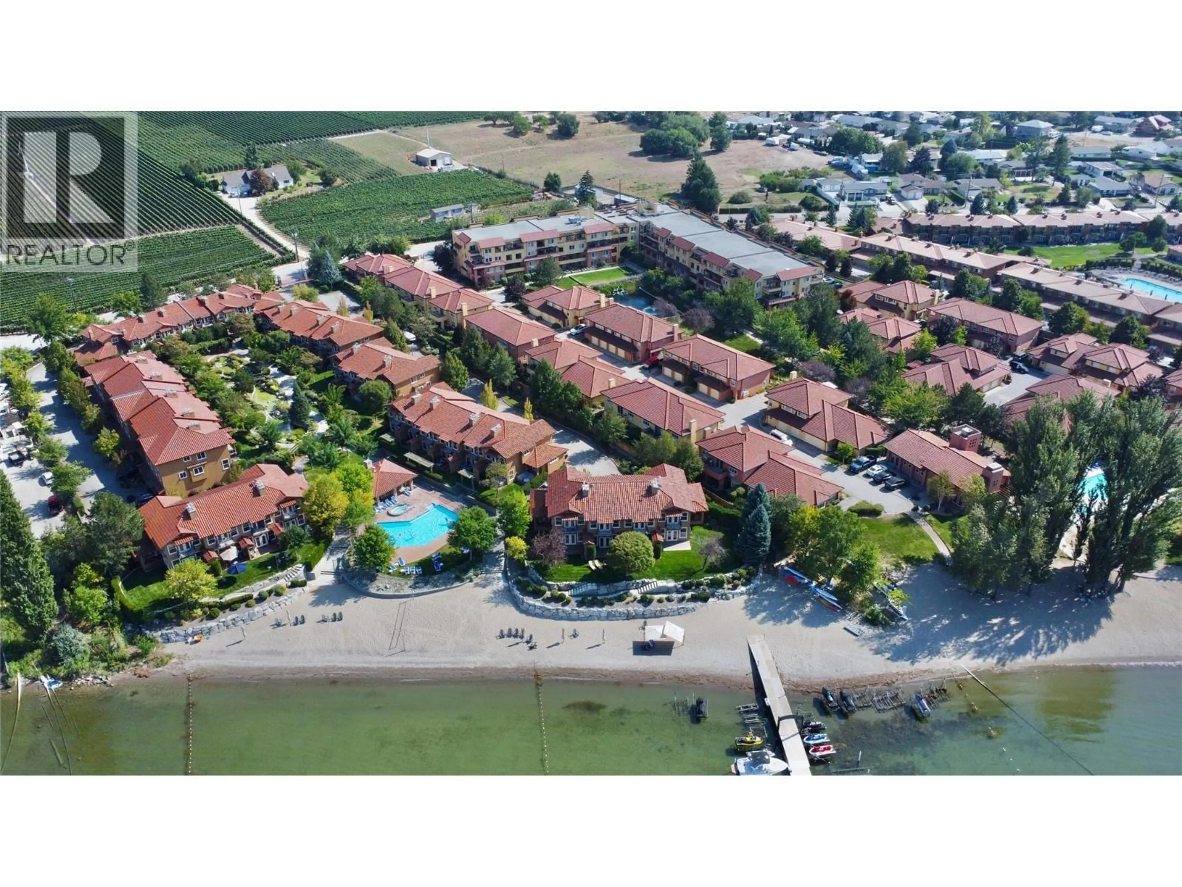 A pic from outside/outdoor area/front of a property/back of a property/a pic from drone, street for 406 - 7600 COTTONWOOD DRIVE, Osoyoos British Columbia V0H1V3