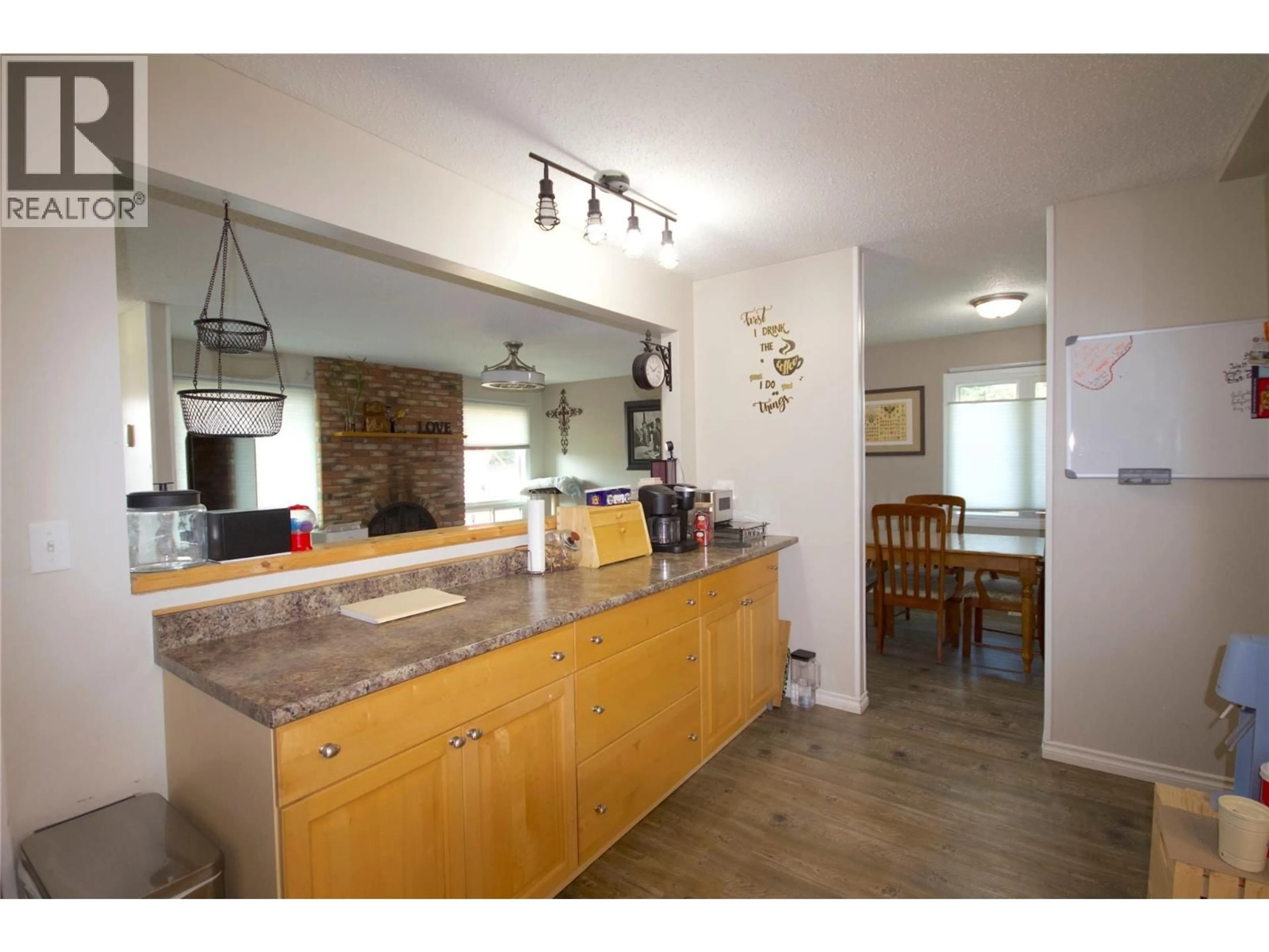 Open concept kitchen, unknown for 1505 113 AVENUE, Dawson Creek British Columbia V1G2Z4
