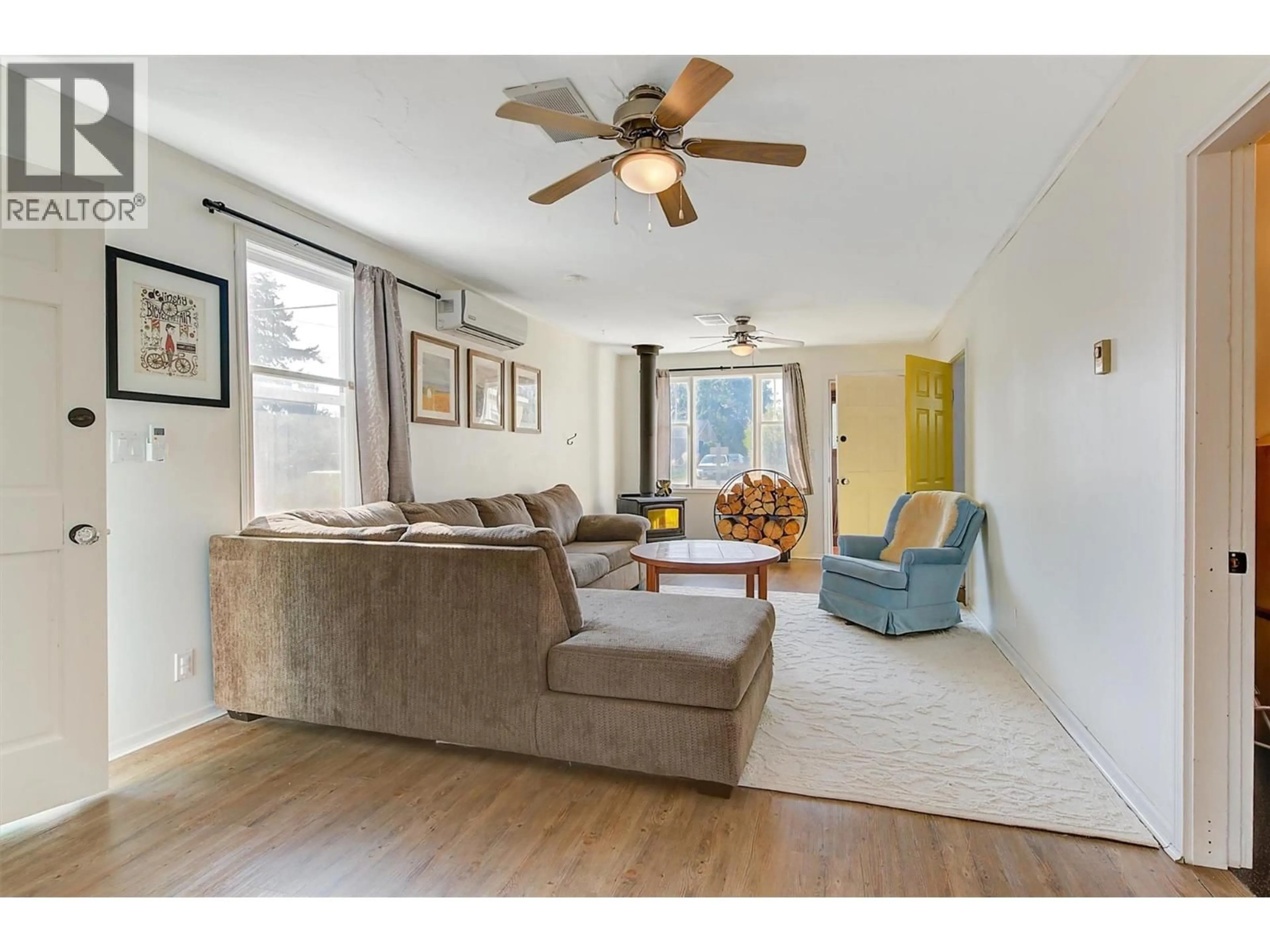 Living room with furniture, unknown for 1060 TATARYN ROAD, Kelowna British Columbia V1X1N8