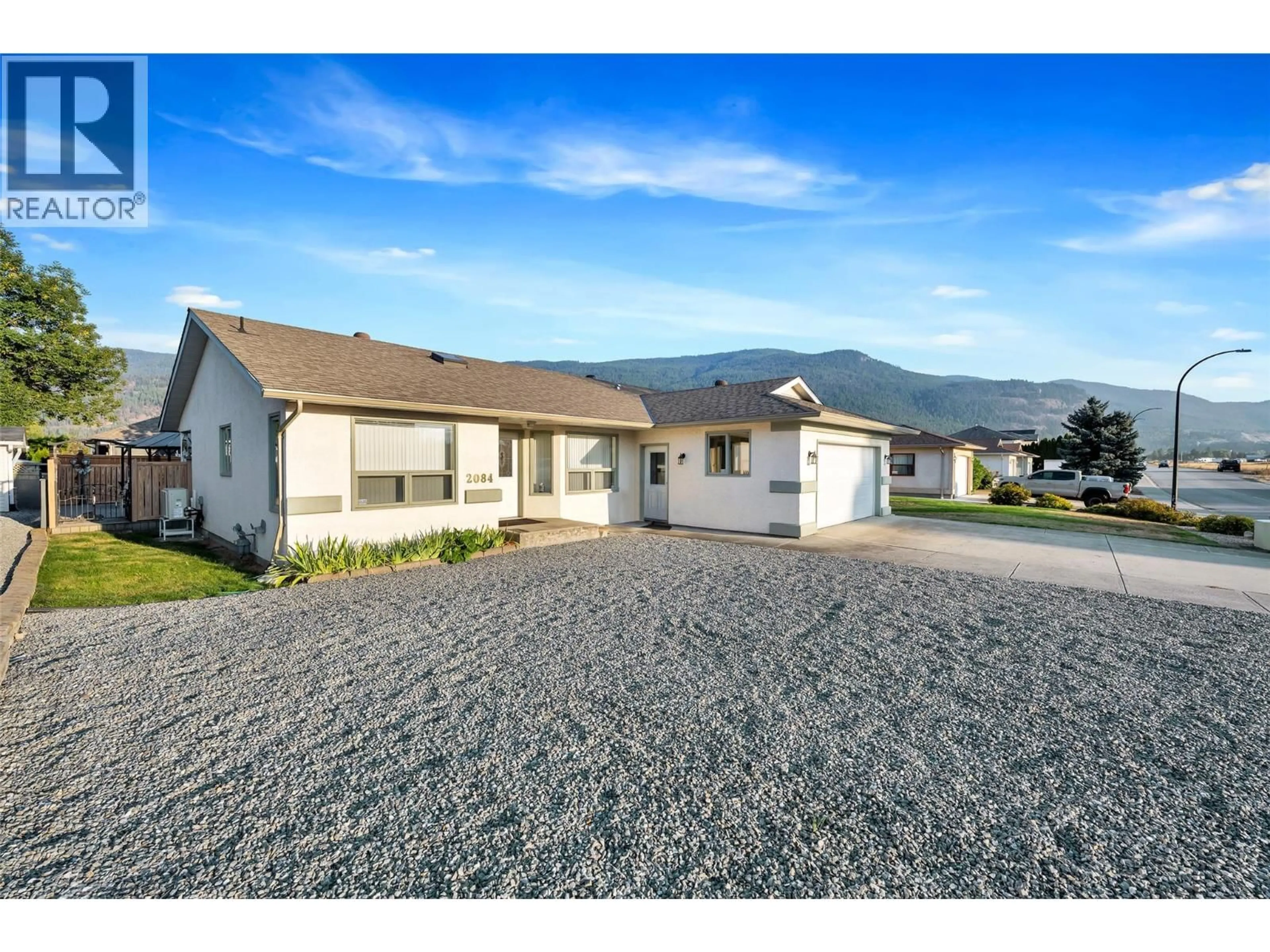 A pic from outside/outdoor area/front of a property/back of a property/a pic from drone, mountain view for 2084 OKANAGAN STREET, Armstrong British Columbia V4Y0C4