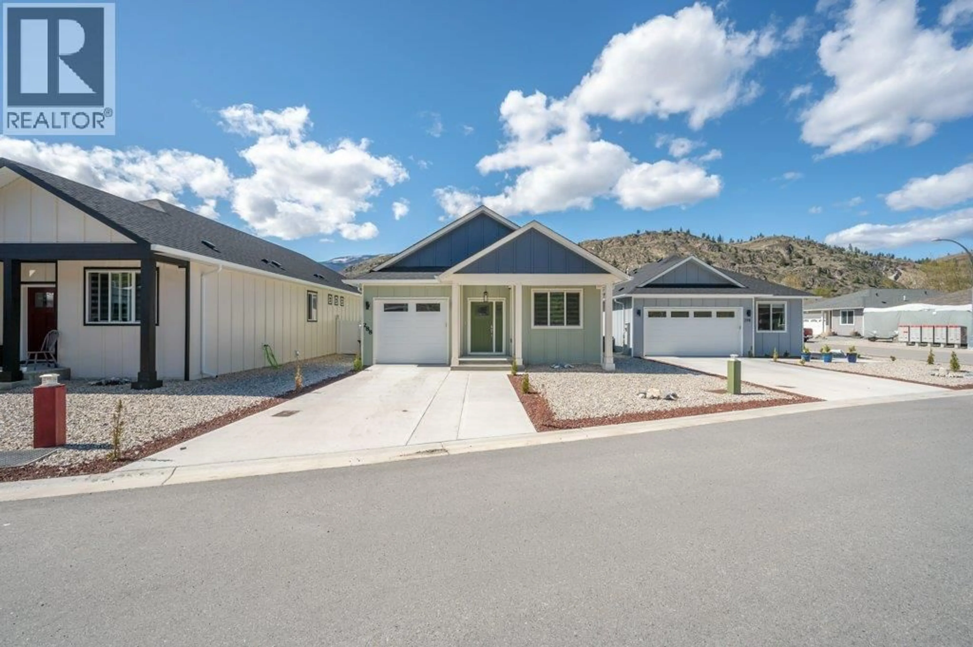 Home with vinyl exterior material, mountain view for 288 BENTGRASS AVENUE, Oliver British Columbia V0H1T3