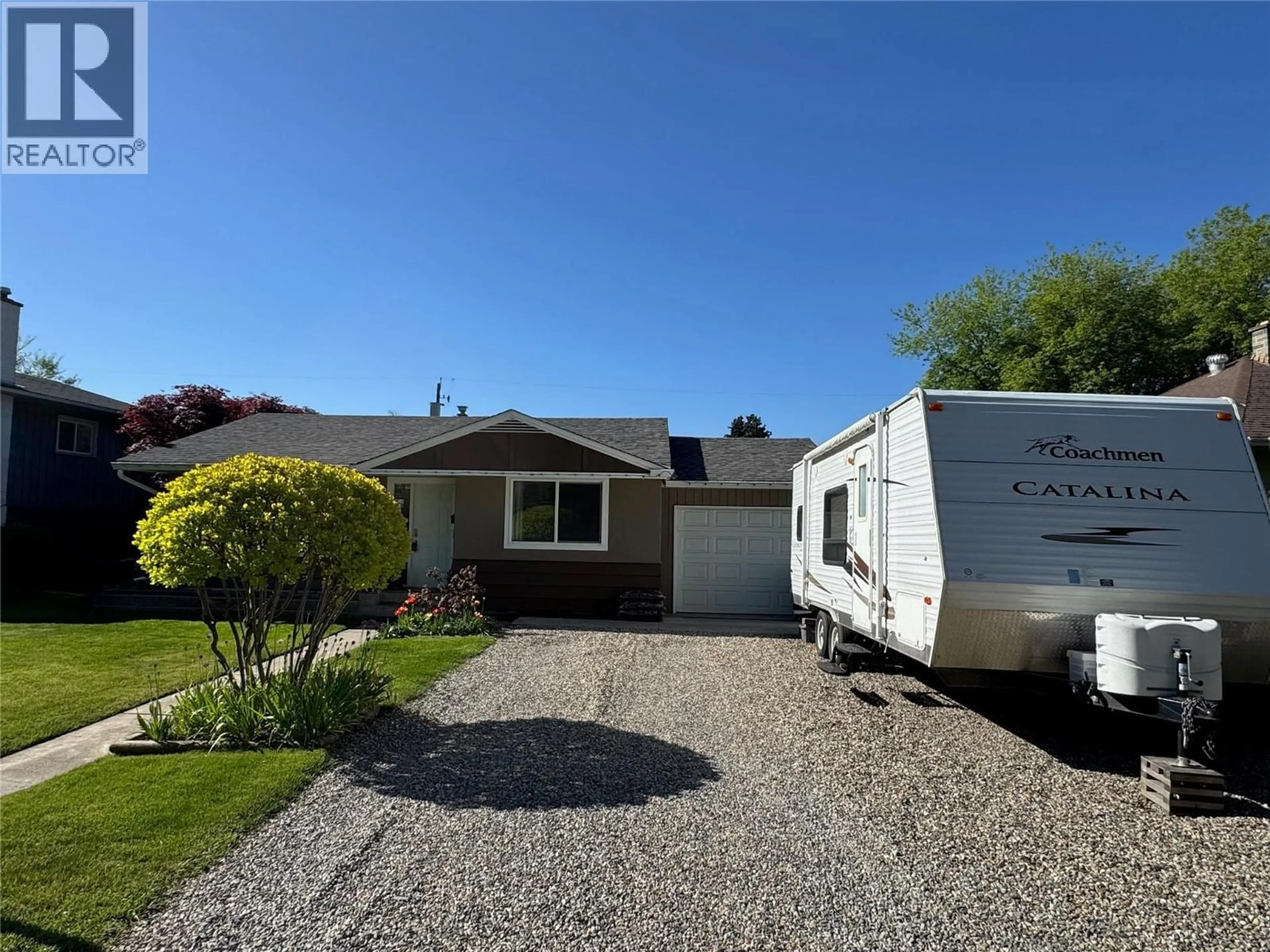 A pic from outside/outdoor area/front of a property/back of a property/a pic from drone, street for 4106 28 AVENUE, Vernon British Columbia V1T1X5