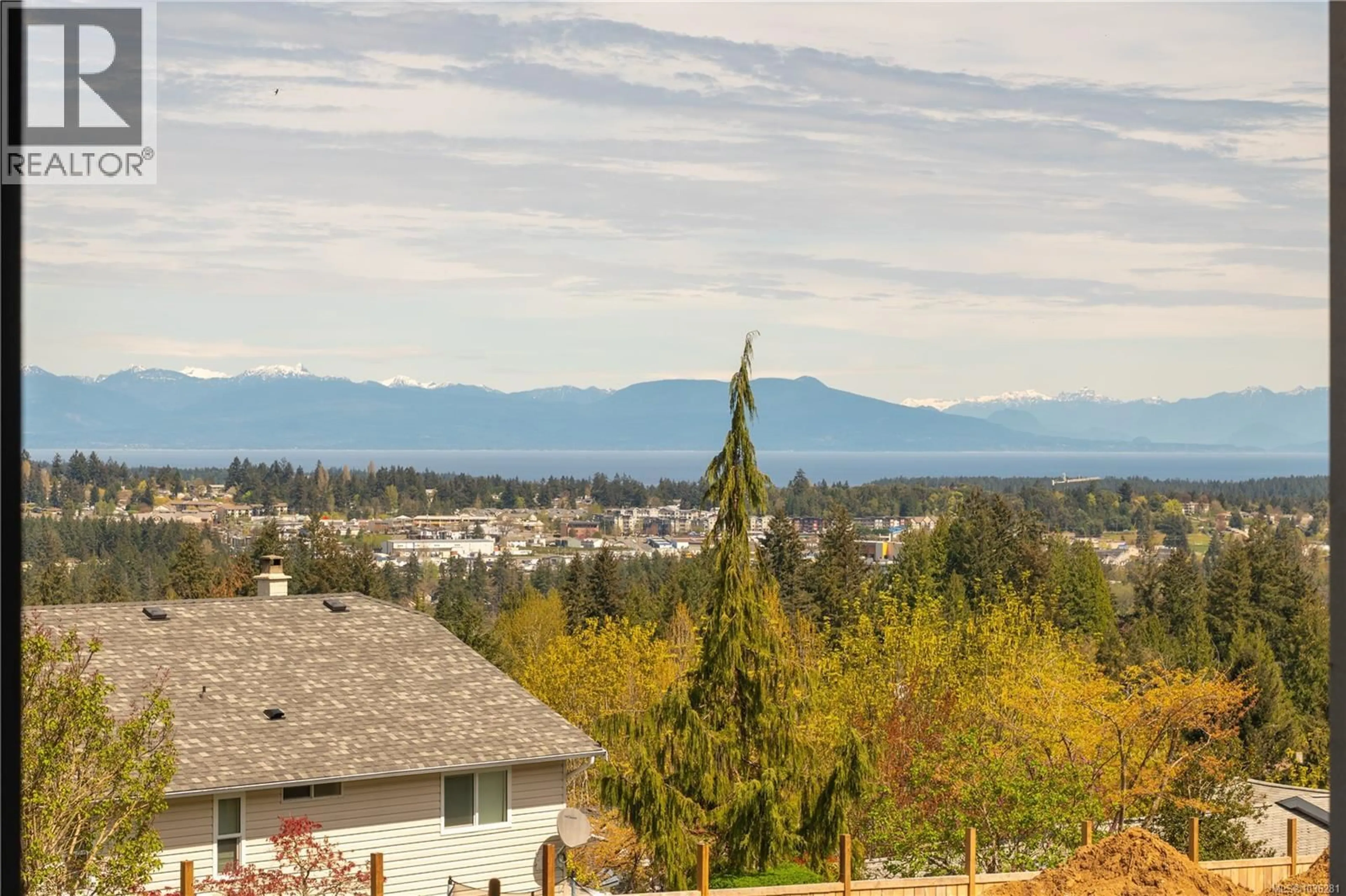 A pic from outside/outdoor area/front of a property/back of a property/a pic from drone, mountain view for 101 - 2302 ARBOT ROAD, Nanaimo British Columbia V9R6S8