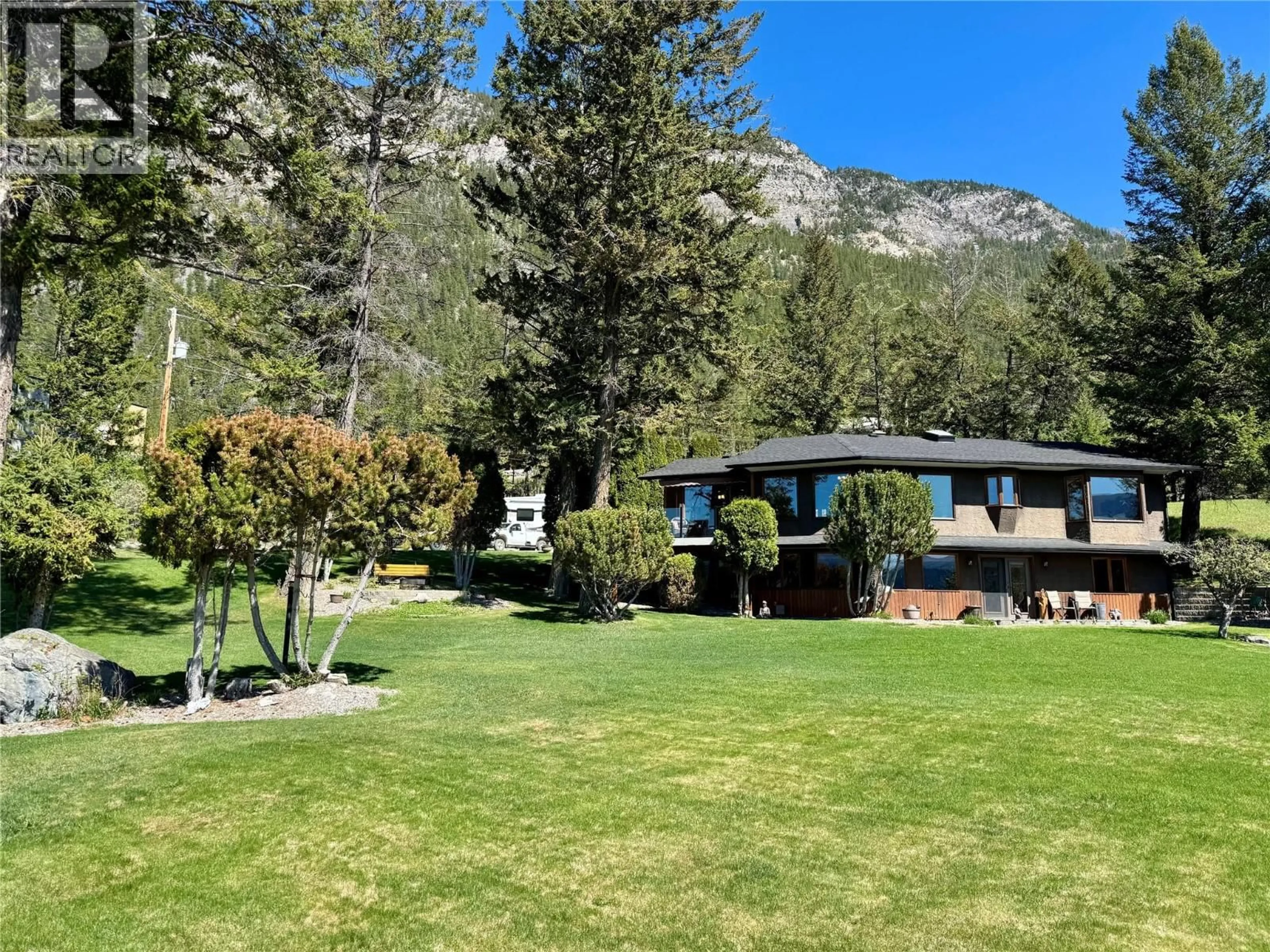 A pic from outside/outdoor area/front of a property/back of a property/a pic from drone, mountain view for 8380 RICHARDSON CRESCENT, Canal Flats British Columbia V0B1B0
