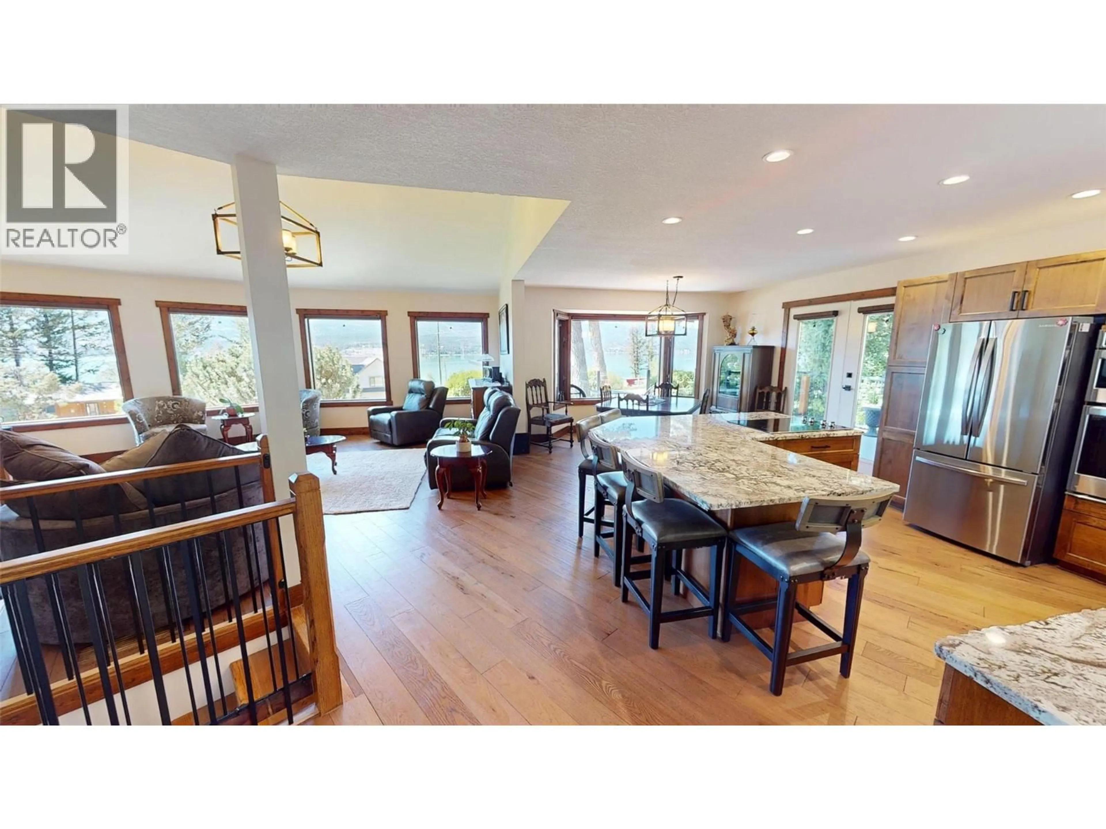 Open concept kitchen, wood/laminate floor for 8380 RICHARDSON CRESCENT, Canal Flats British Columbia V0B1B0