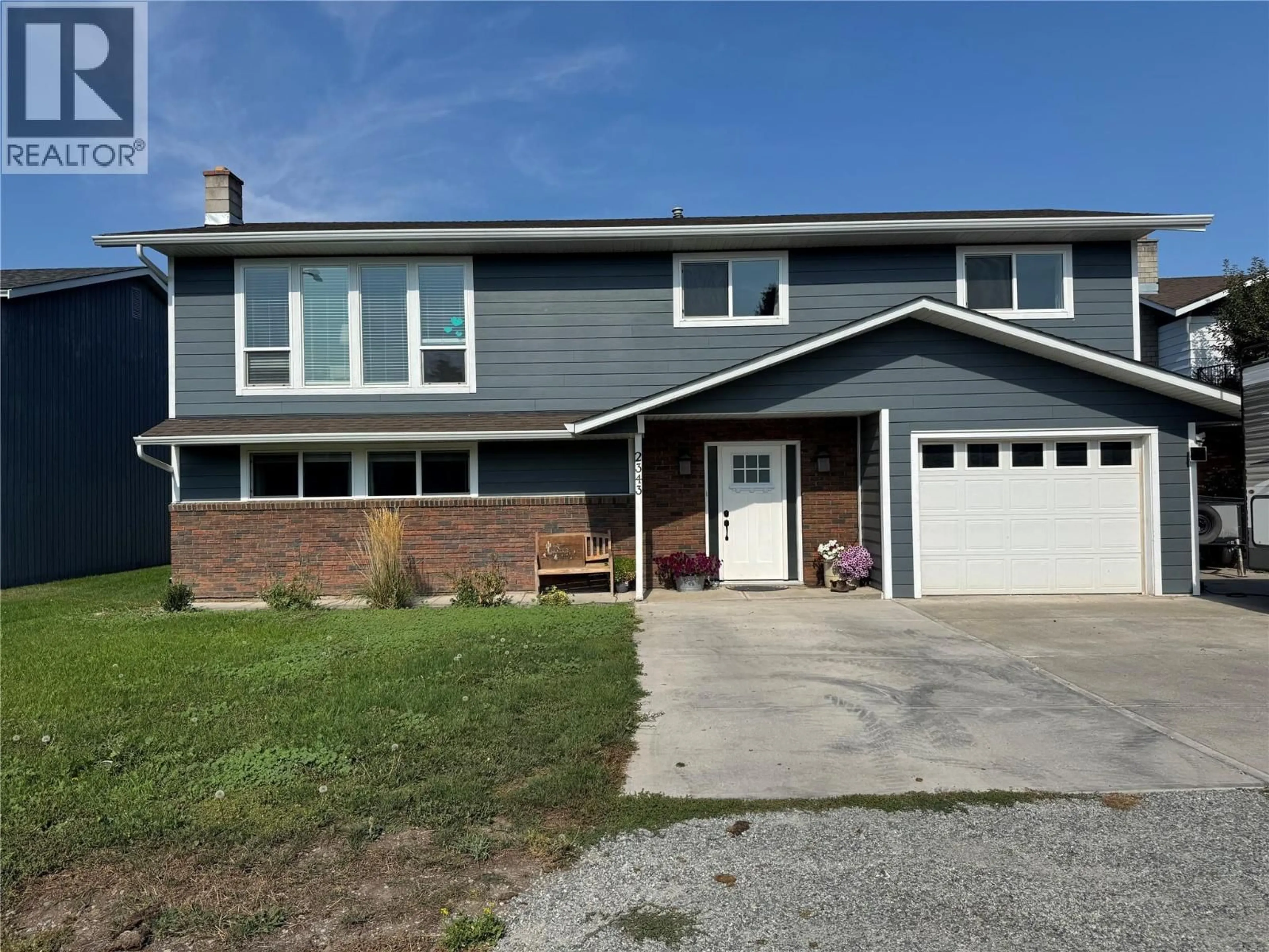 Home with vinyl exterior material, street for 2343 MCGORAN PLACE, Merritt British Columbia V1K1B8