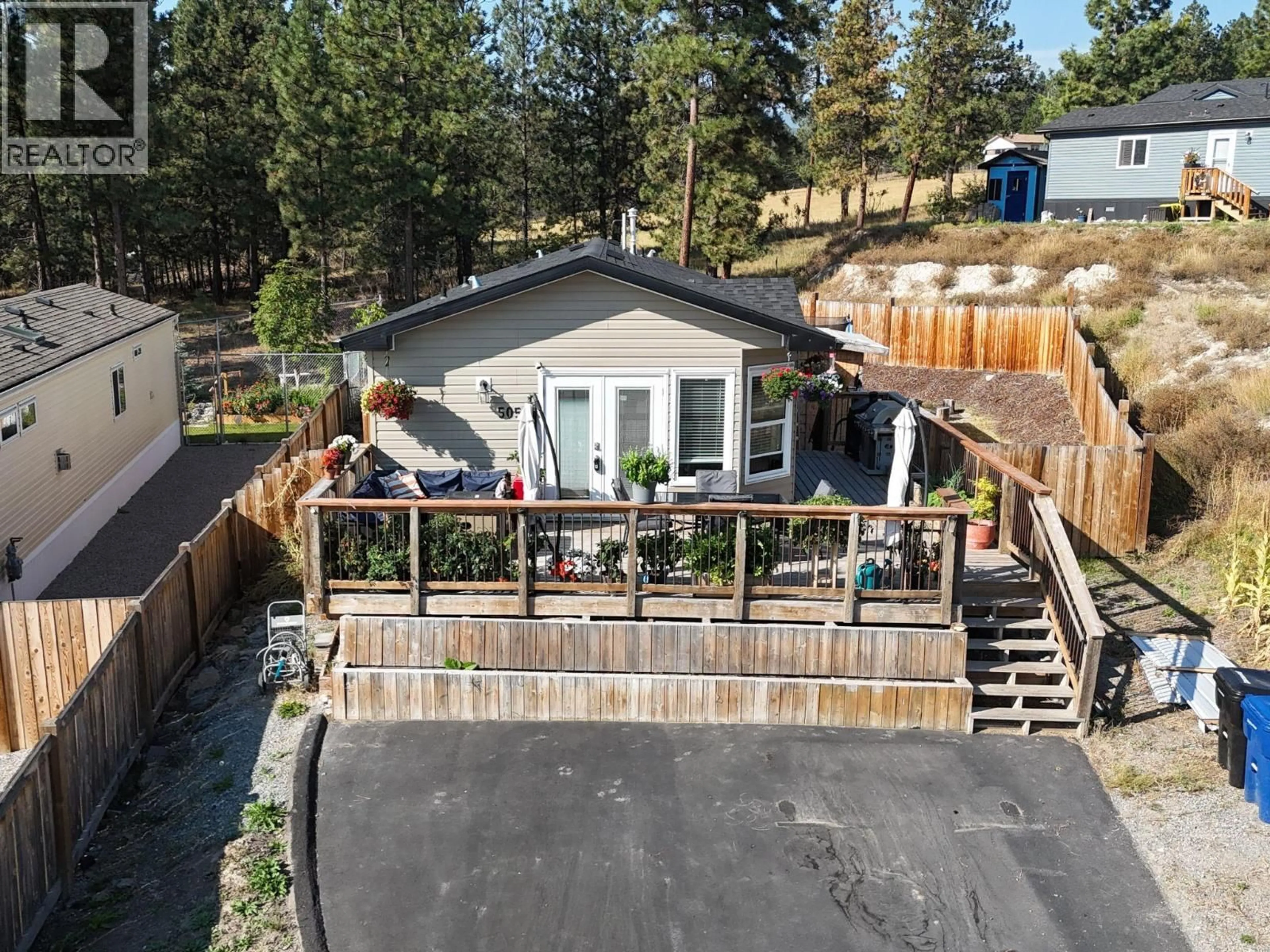 A pic from outside/outdoor area/front of a property/back of a property/a pic from drone, mountain view for 505 STEEPLEVIEW POINT NORTHWEST, Cranbrook British Columbia V1C5L3