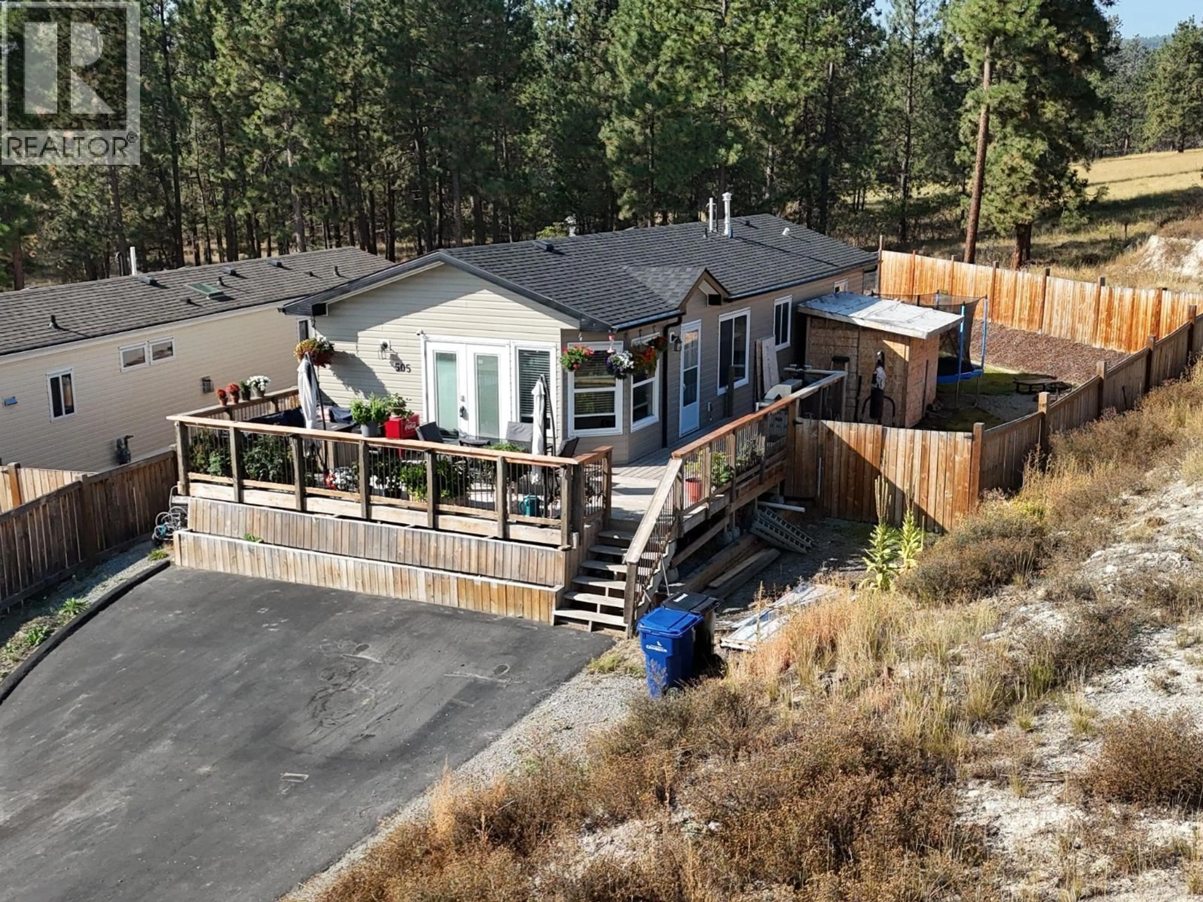 A pic from outside/outdoor area/front of a property/back of a property/a pic from drone, mountain view for 505 STEEPLEVIEW POINT NORTHWEST, Cranbrook British Columbia V1C5L3
