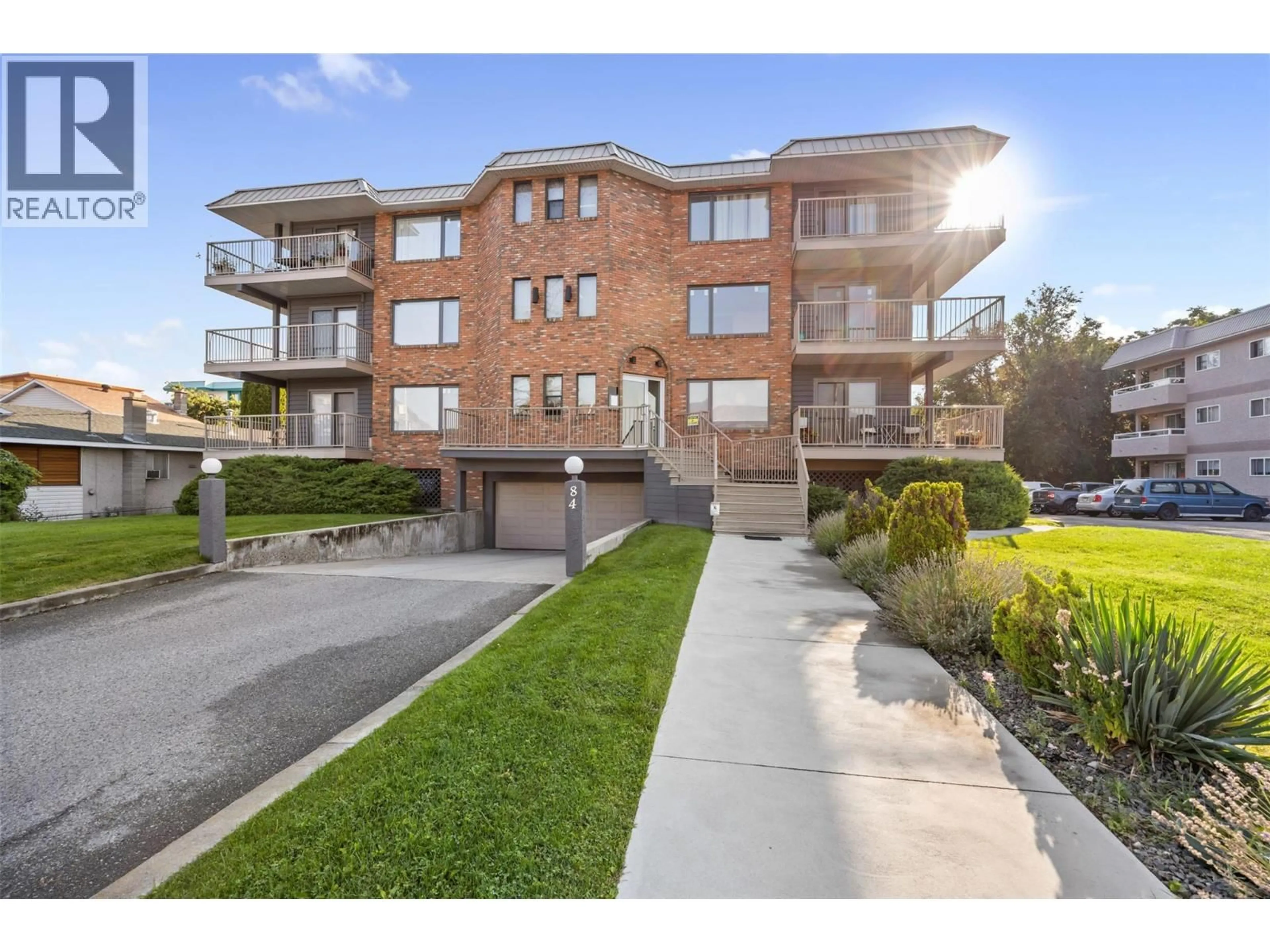 A pic from outside/outdoor area/front of a property/back of a property/a pic from drone, street for 204 - 84 VAN HORNE STREET, Penticton British Columbia V2A4J8