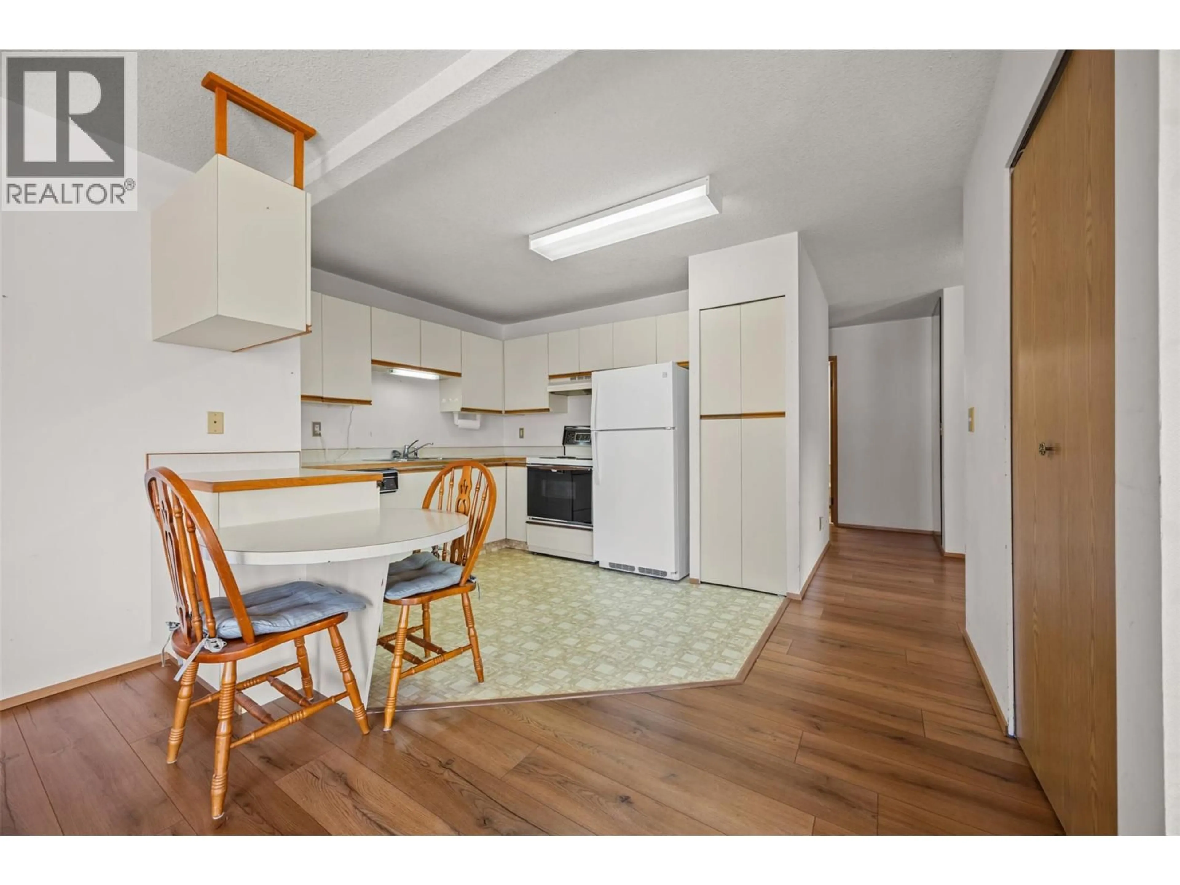 Standard kitchen, wood/laminate floor for 204 - 84 VAN HORNE STREET, Penticton British Columbia V2A4J8