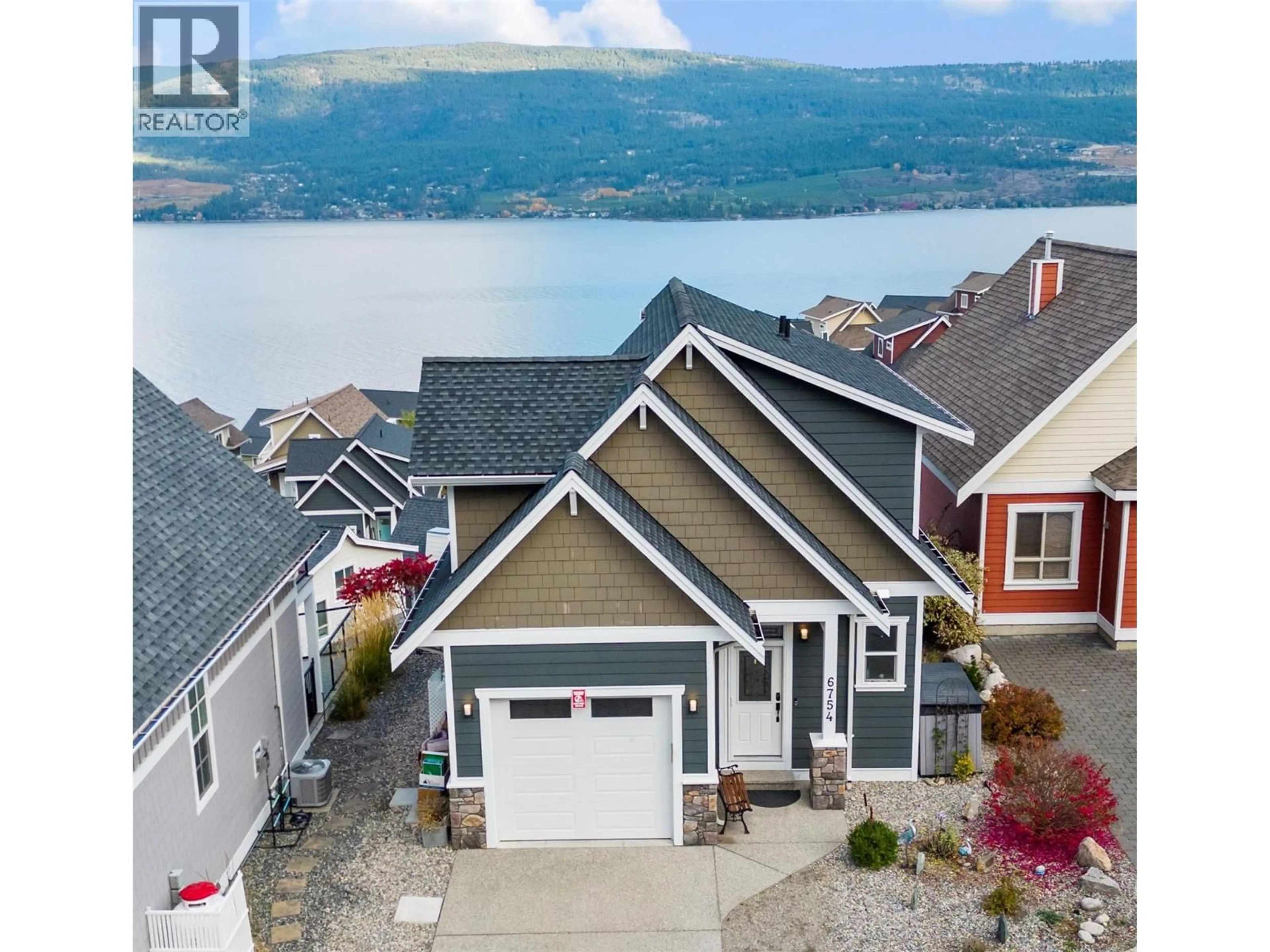 A pic from outside/outdoor area/front of a property/back of a property/a pic from drone, water/lake/river/ocean view for 6754 LA PALMA LOOP, Kelowna British Columbia V1Z3R8
