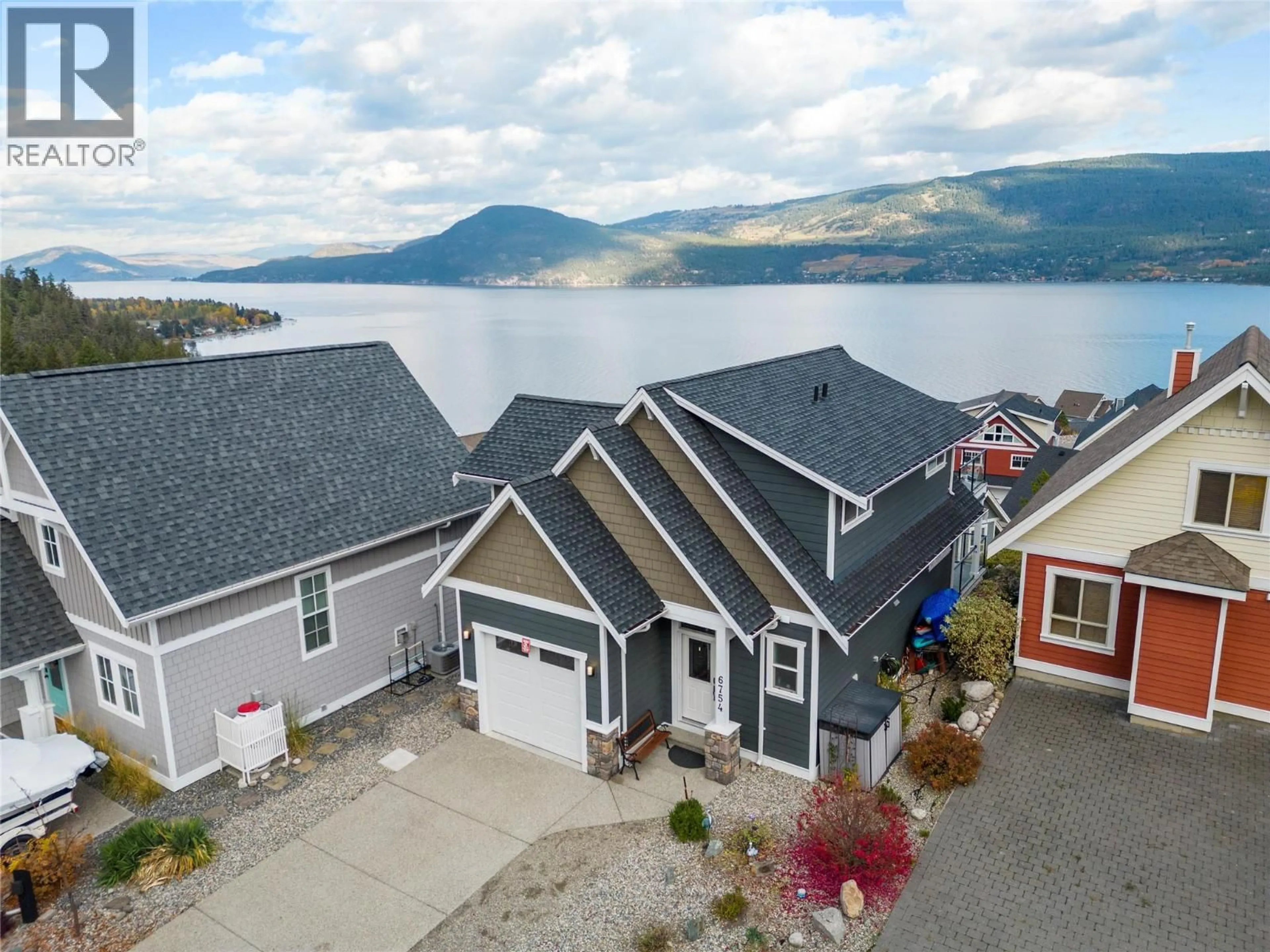 A pic from outside/outdoor area/front of a property/back of a property/a pic from drone, water/lake/river/ocean view for 6754 LA PALMA LOOP, Kelowna British Columbia V1Z3R8