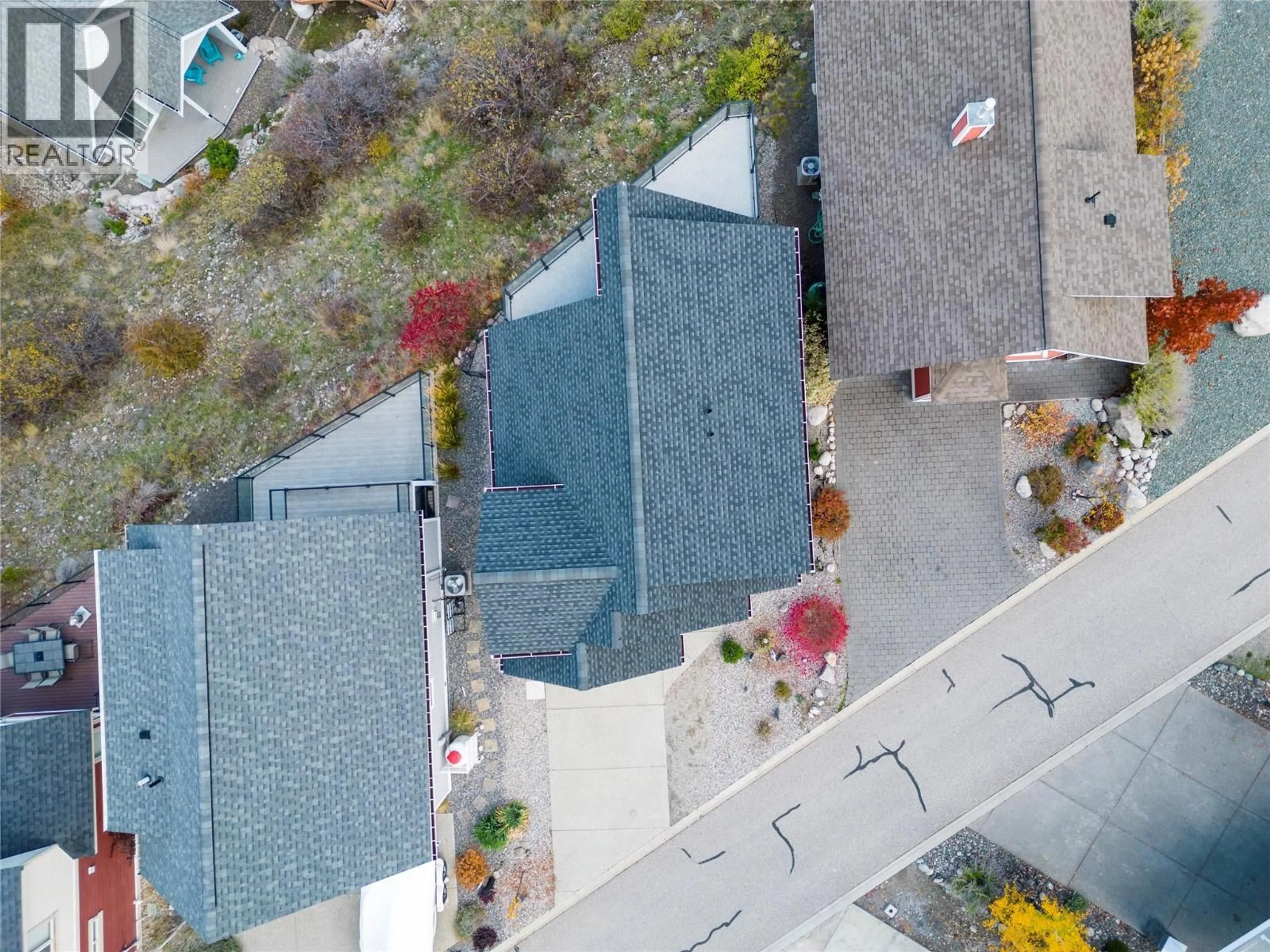 A pic from outside/outdoor area/front of a property/back of a property/a pic from drone, unknown for 6754 LA PALMA LOOP, Kelowna British Columbia V1Z3R8