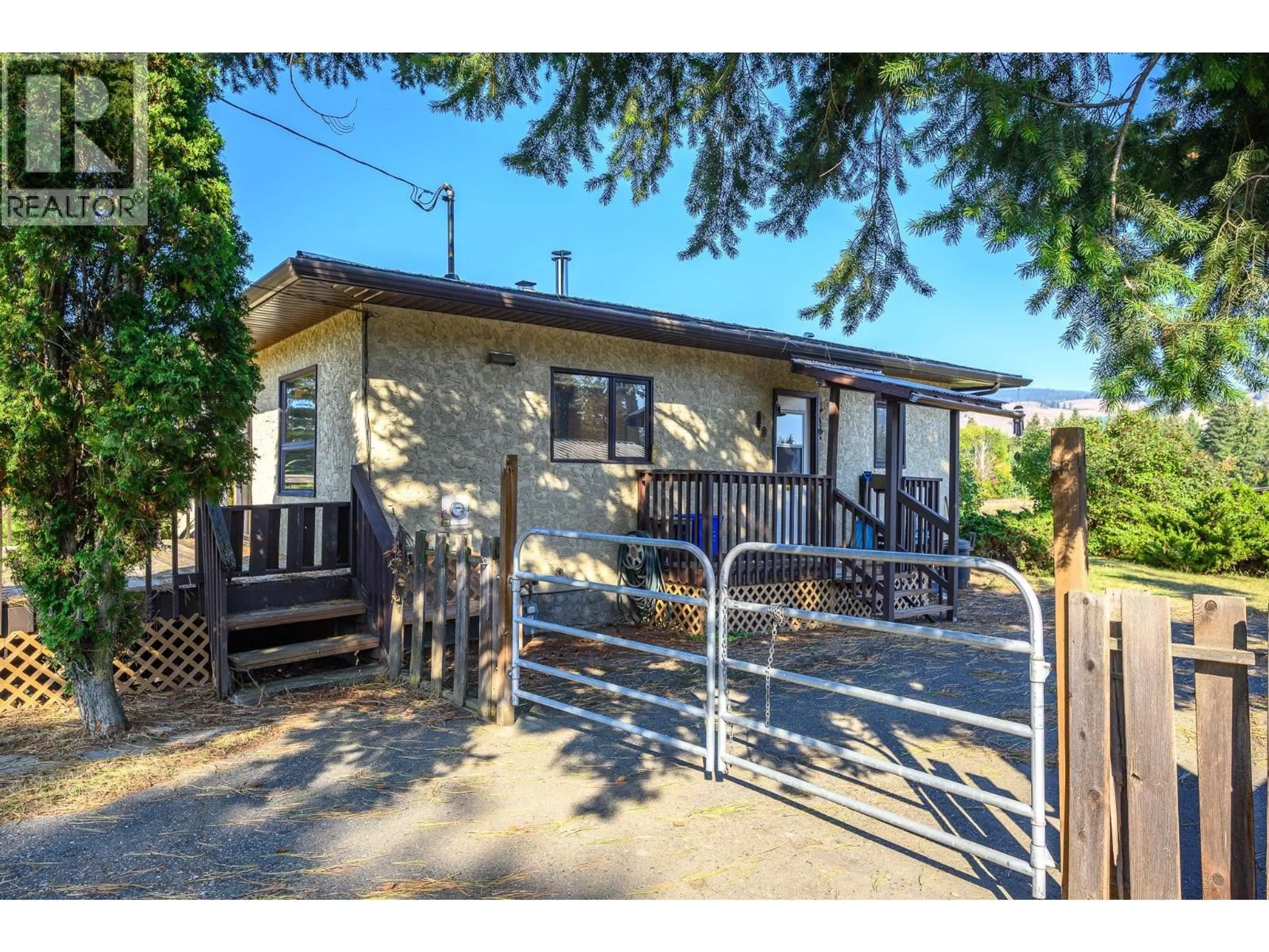A pic from outside/outdoor area/front of a property/back of a property/a pic from drone, street for 599 WHITEVALE ROAD, Lumby British Columbia V0E2G7