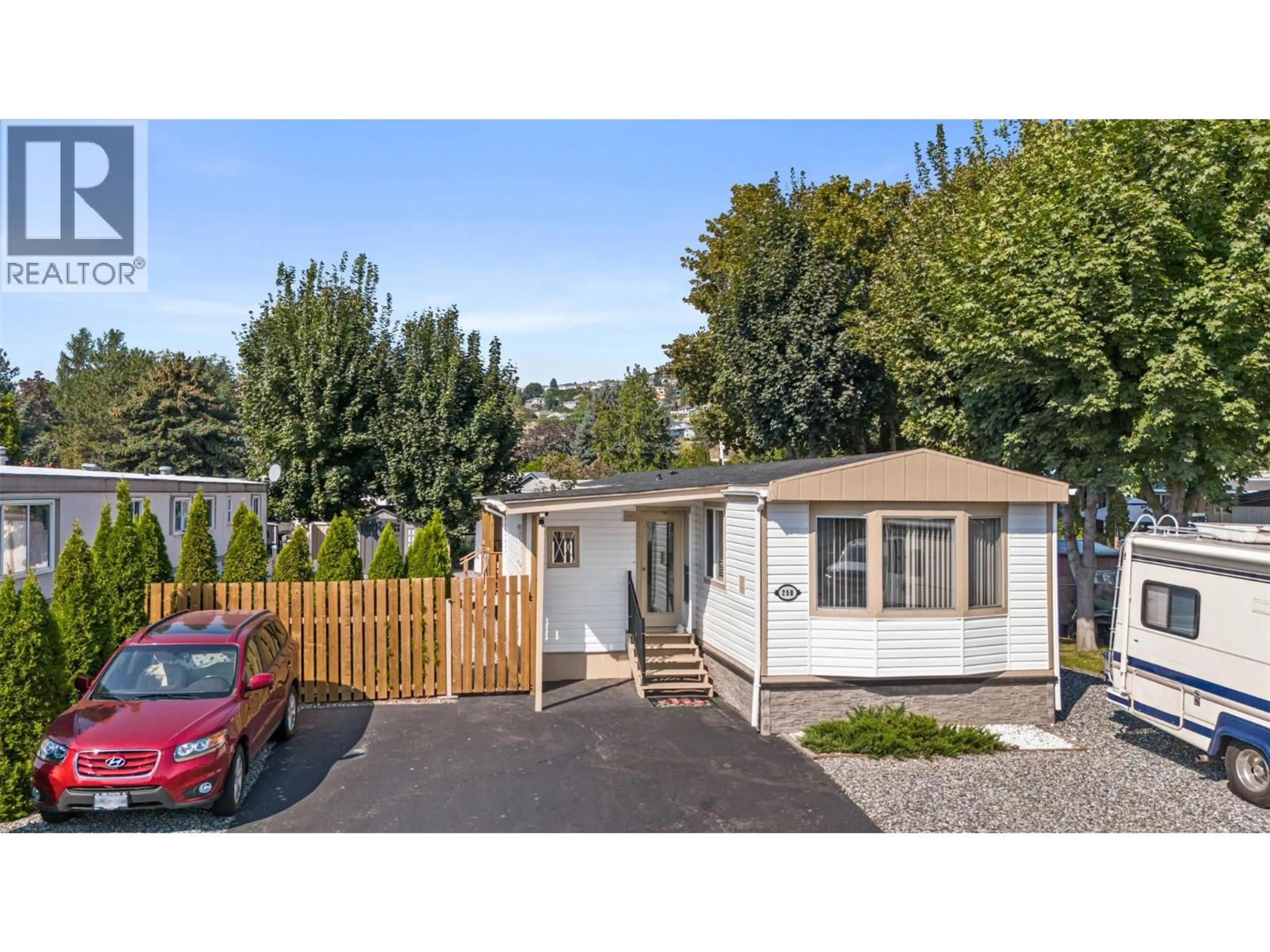 Home with vinyl exterior material, street for 250 - 2001 HIGHWAY 97 SOUTH HIGHWAY, West Kelowna British Columbia V1Z3E3