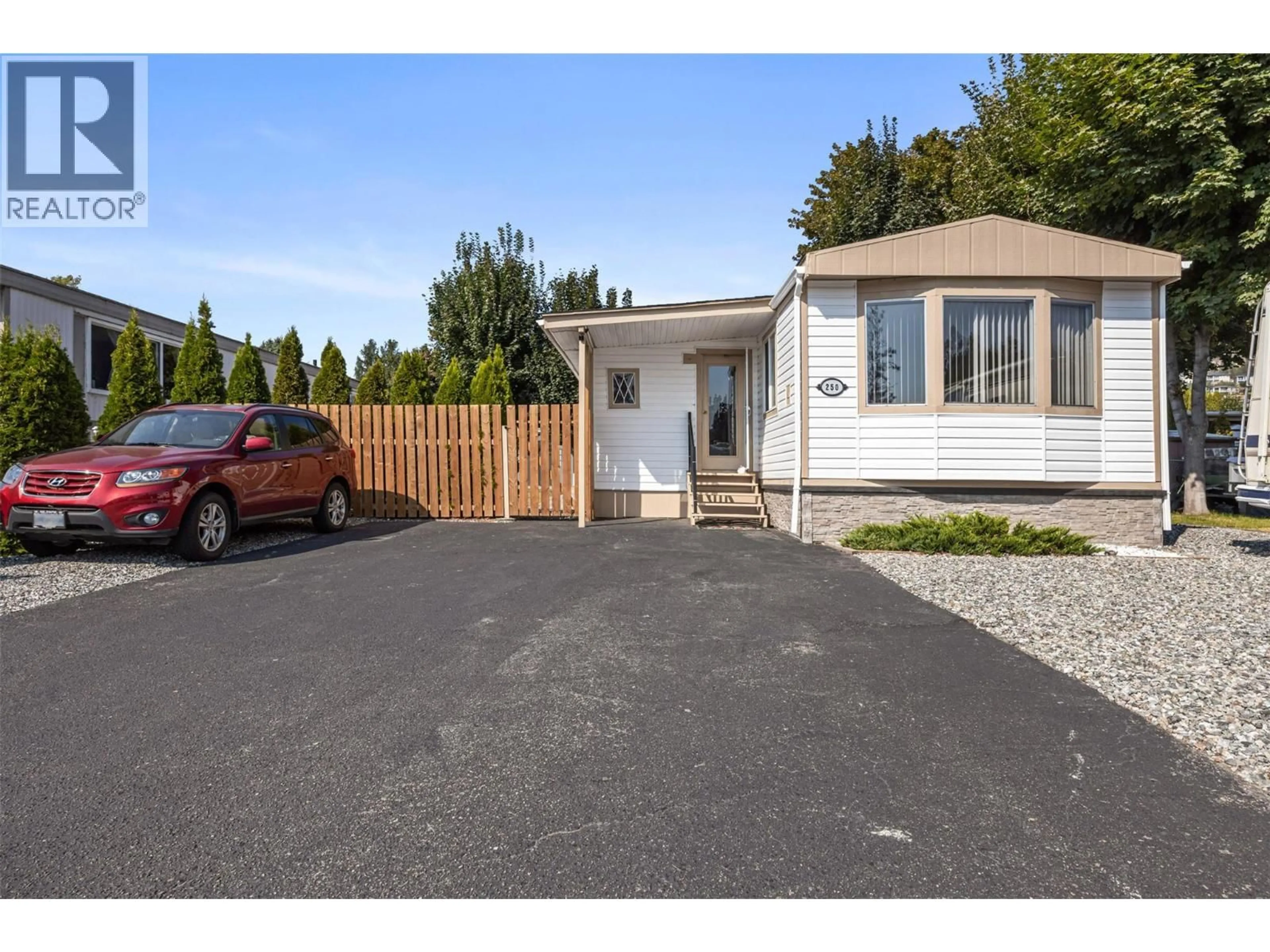 Home with vinyl exterior material, street for 250 - 2001 HIGHWAY 97 SOUTH HIGHWAY, West Kelowna British Columbia V1Z3E3