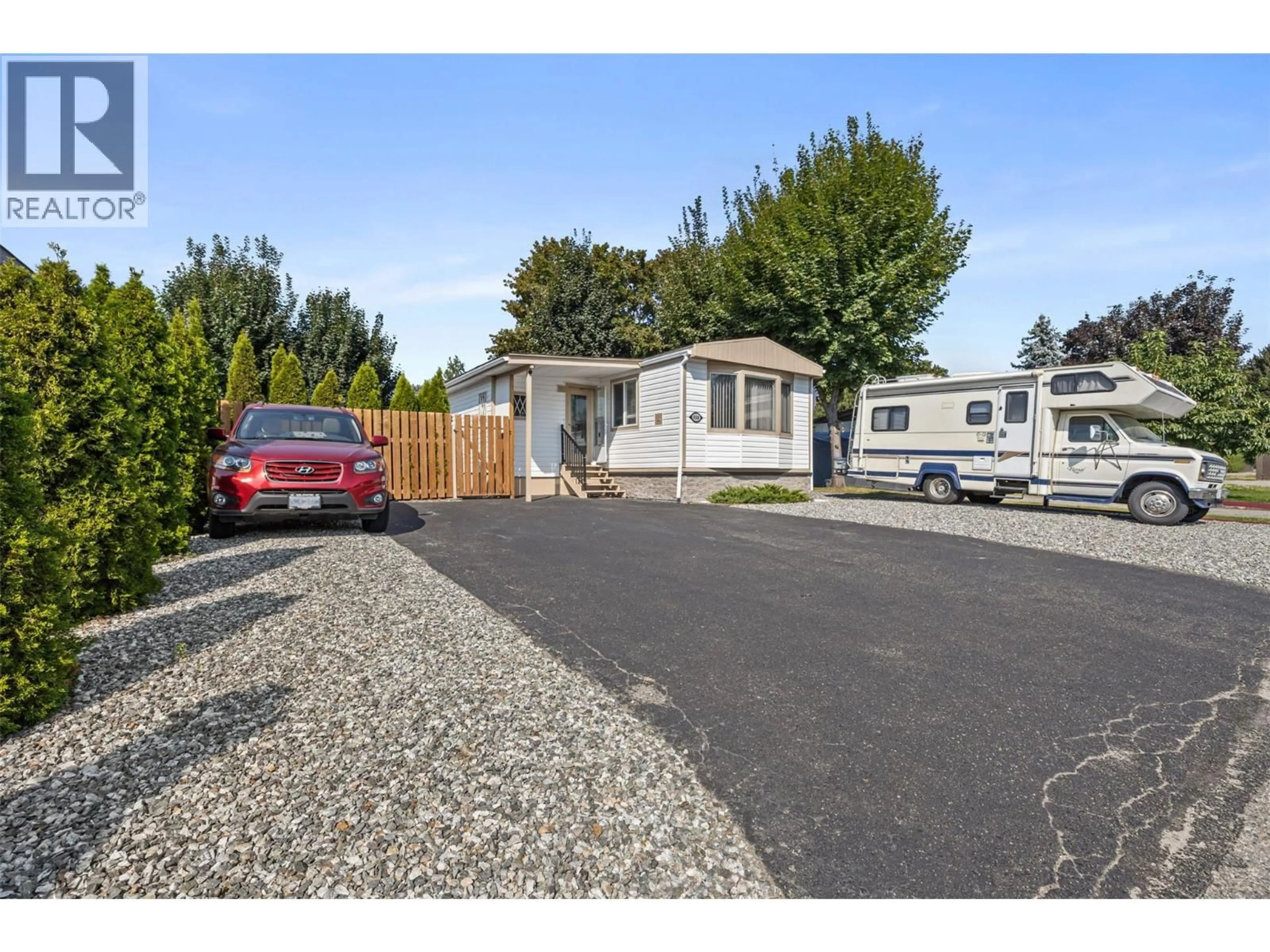 Home with vinyl exterior material, street for 250 - 2001 HIGHWAY 97 SOUTH HIGHWAY, West Kelowna British Columbia V1Z3E3