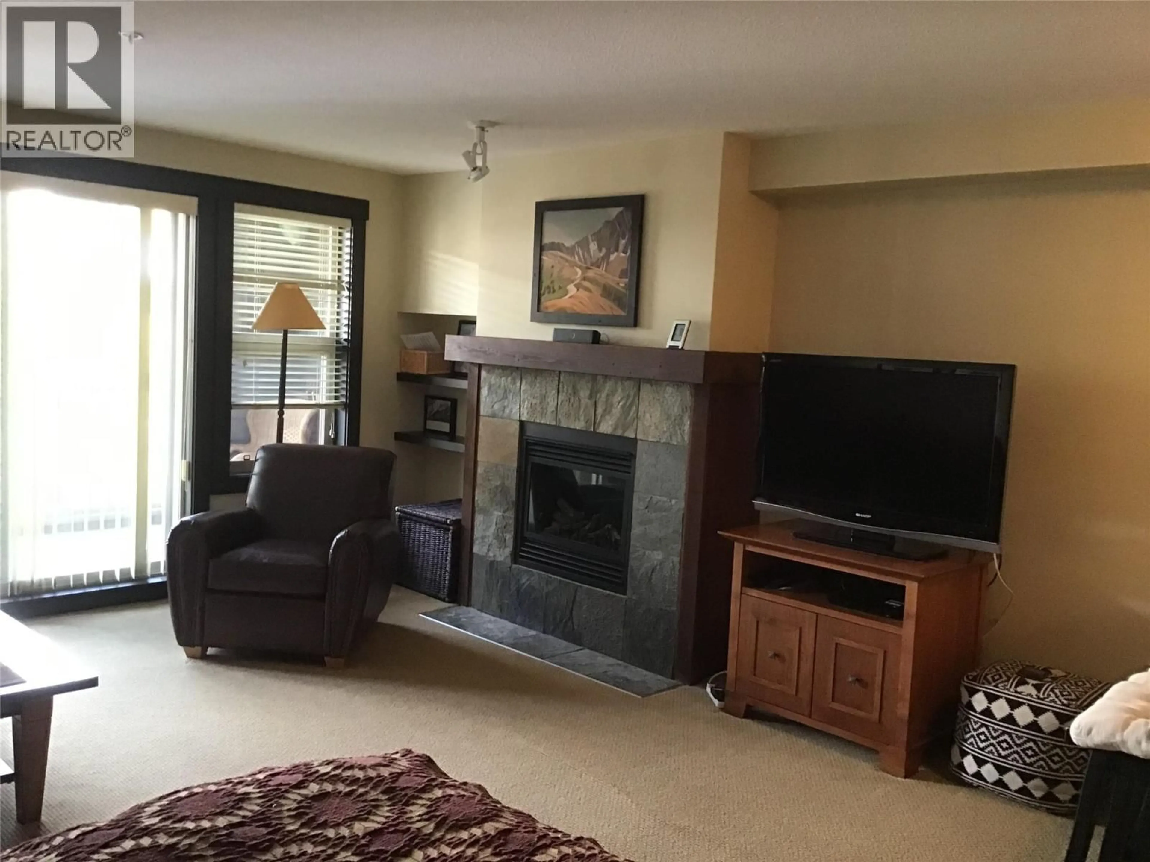 Living room with furniture, ceramic/tile floor for 311B - 2070 SUMMIT DRIVE, Panorama British Columbia V0A1T0