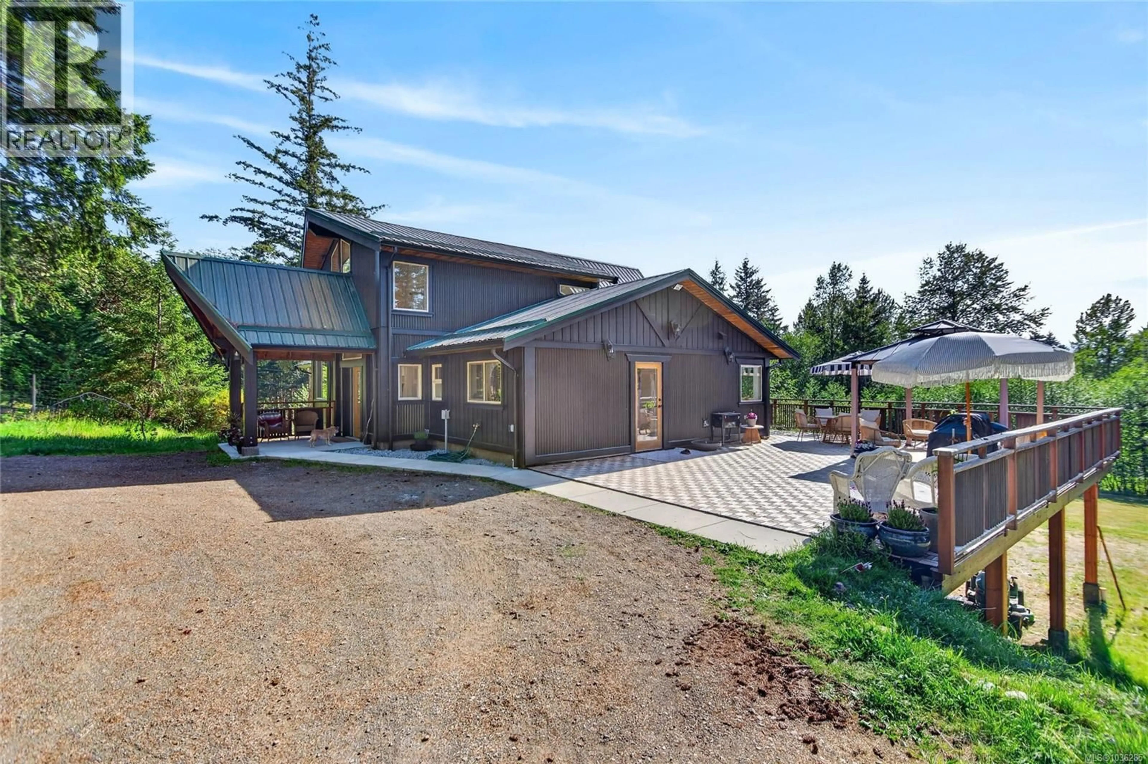 A pic from outside/outdoor area/front of a property/back of a property/a pic from drone, mountain view for 2279/2281 CLARK ROAD, Courtenay British Columbia V9J1T1