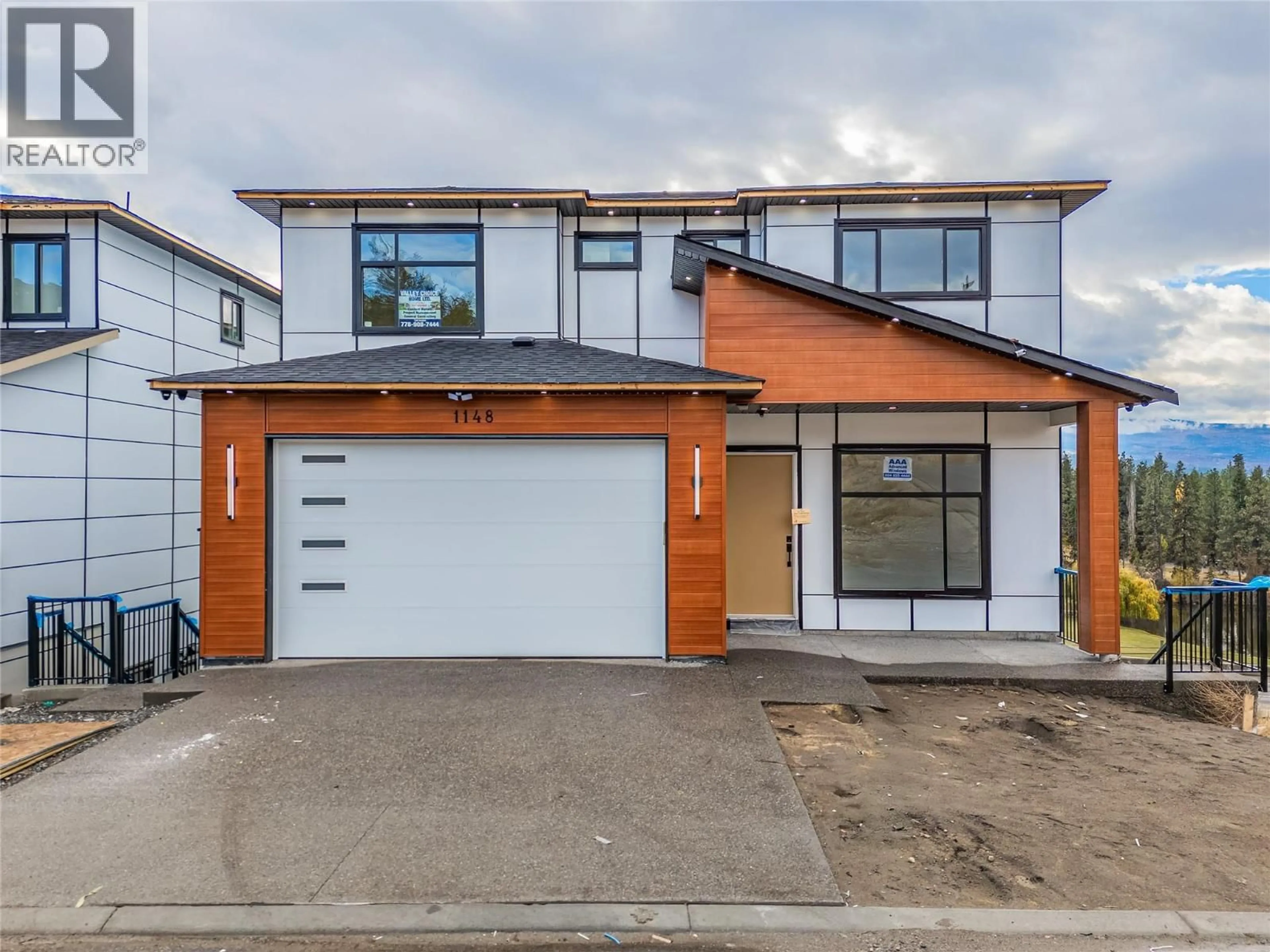 Home with brick exterior material, street for 1148 HUME AVENUE, Kelowna British Columbia V1P0A9