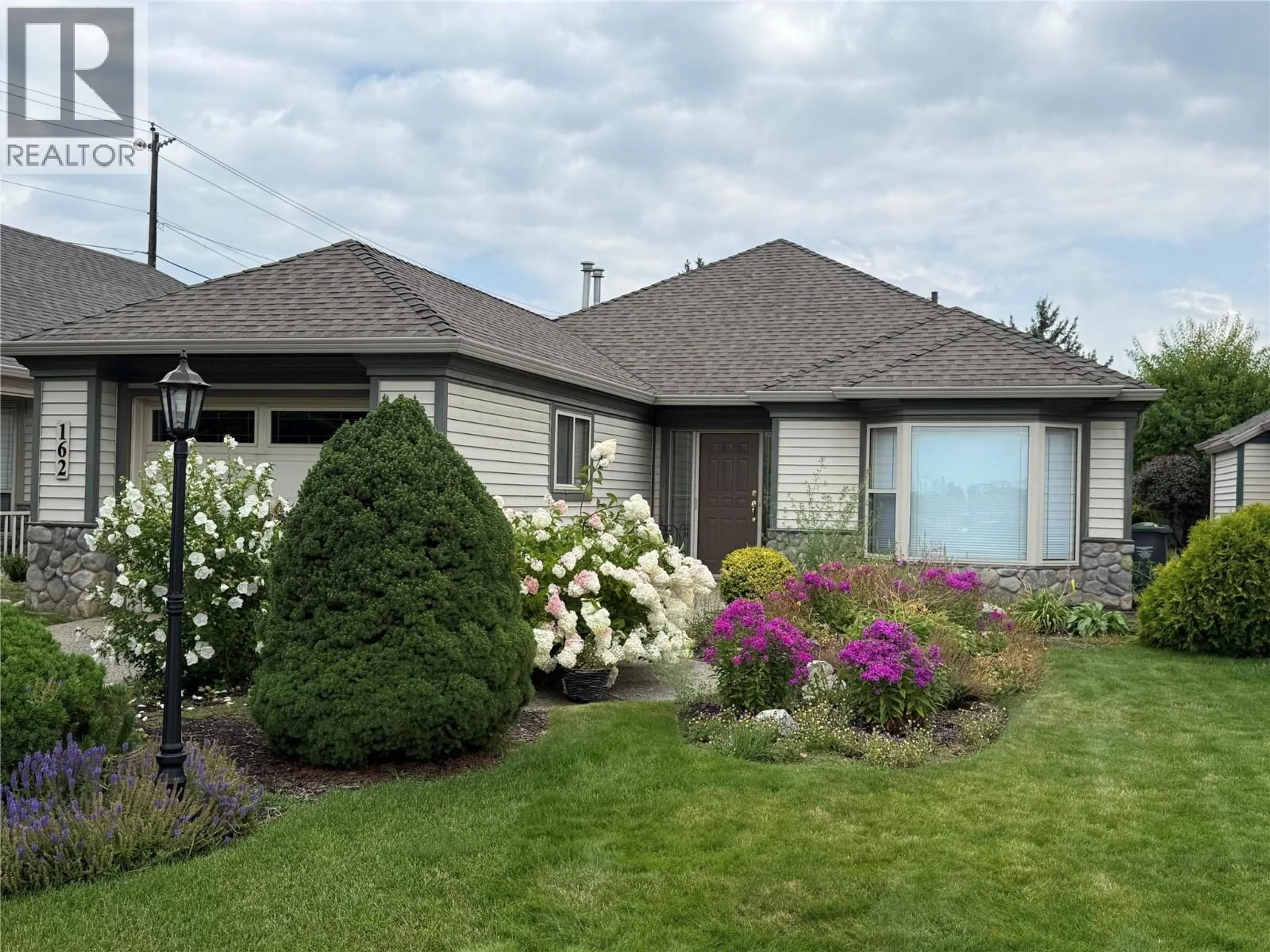 Home with vinyl exterior material, unknown for 162 - 550 YATES ROAD, Kelowna British Columbia V1V1Z4