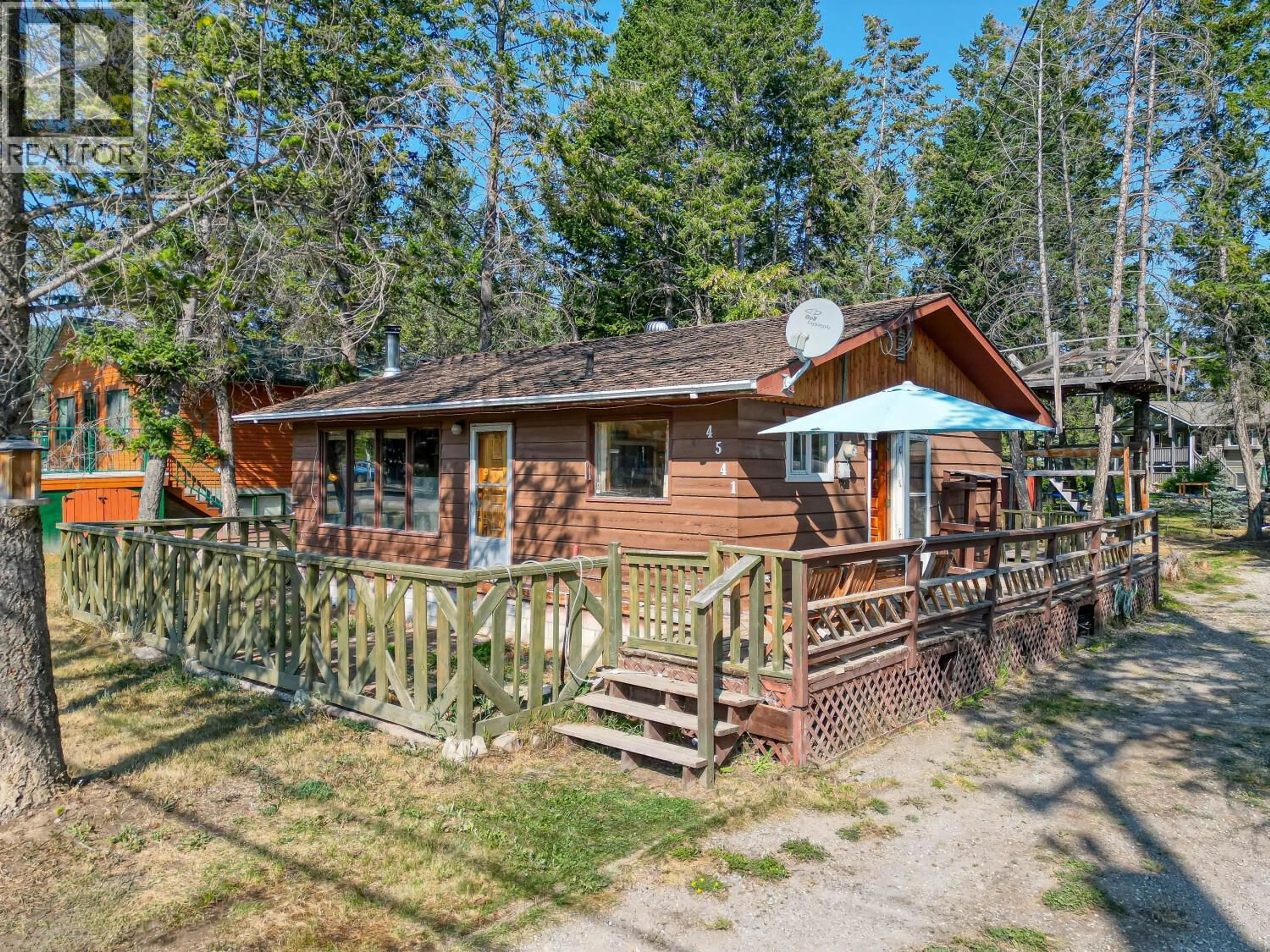 A pic from outside/outdoor area/front of a property/back of a property/a pic from drone, street for 4541 COLUMERE ROAD, Fairmont Hot Springs British Columbia V0B1L2