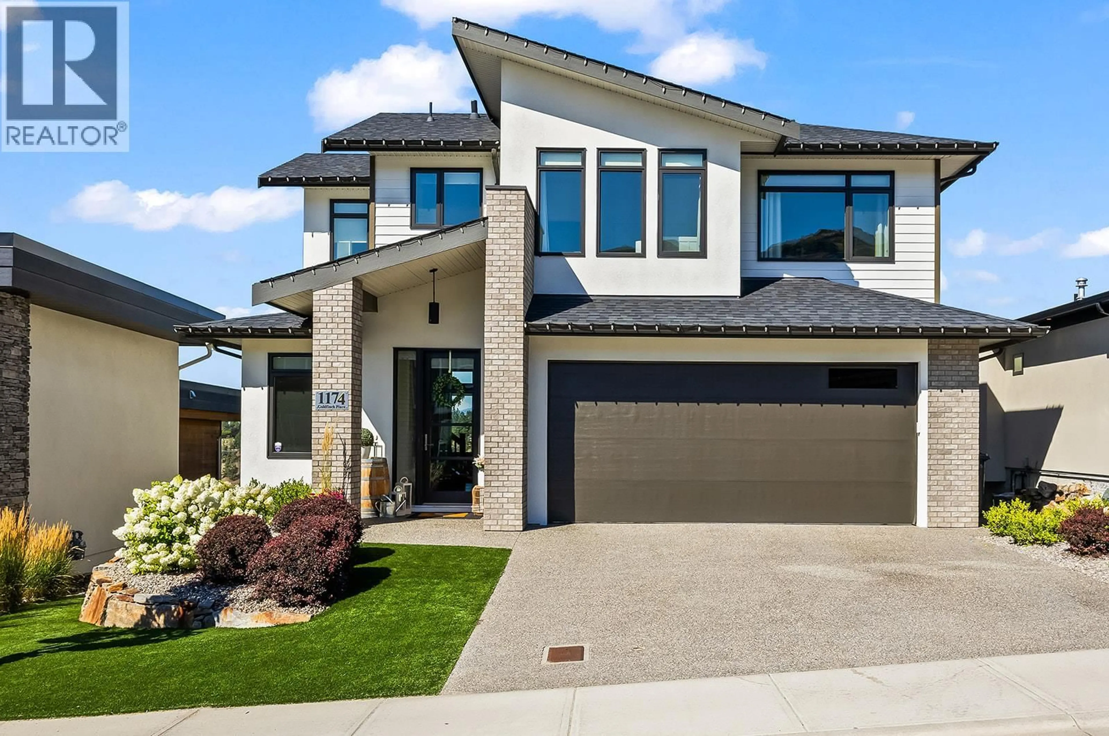 Home with brick exterior material, street for 1174 GOLDFINCH PLACE, Kelowna British Columbia V1W5M1